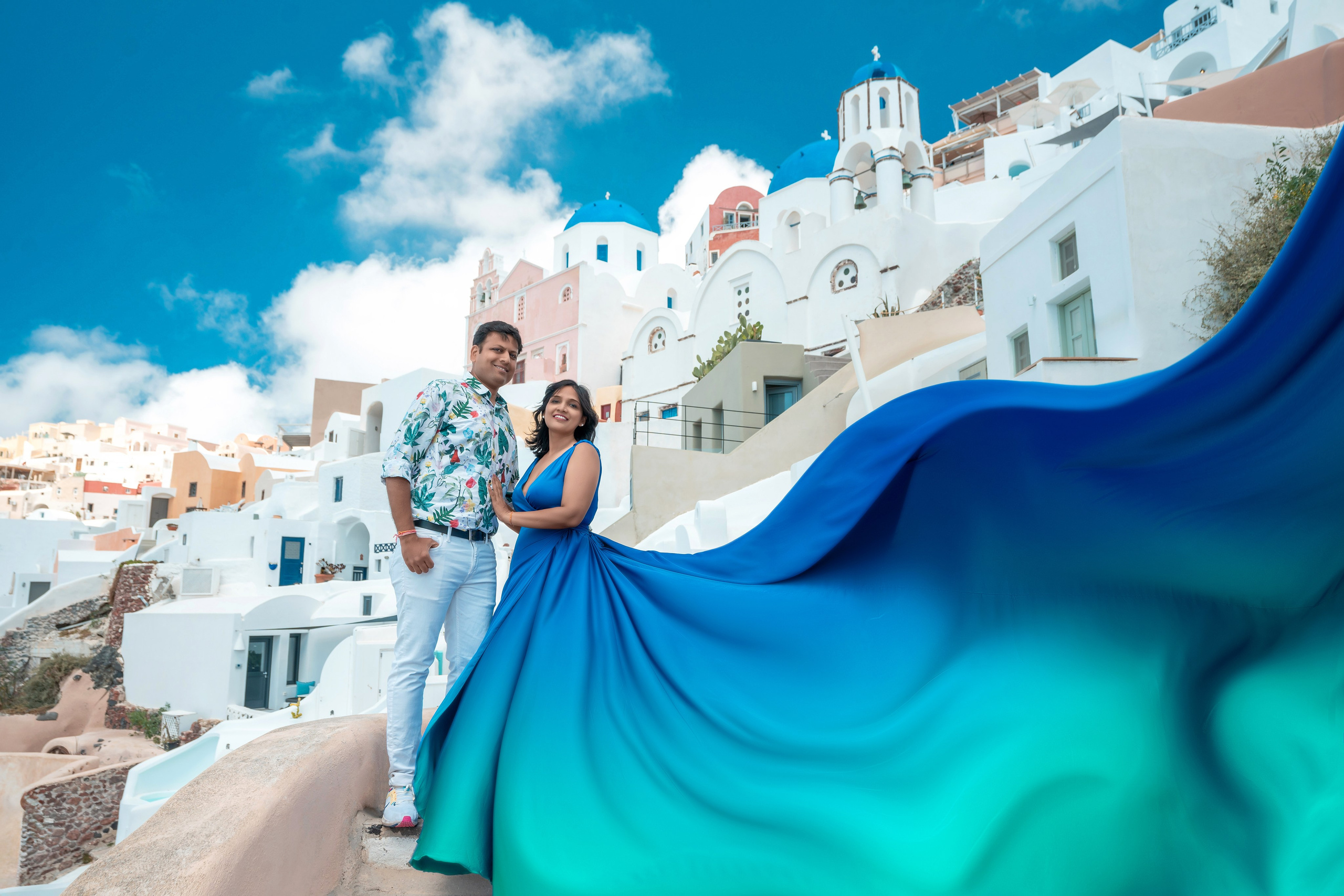 flying dress photoshoot Santorini cliff view