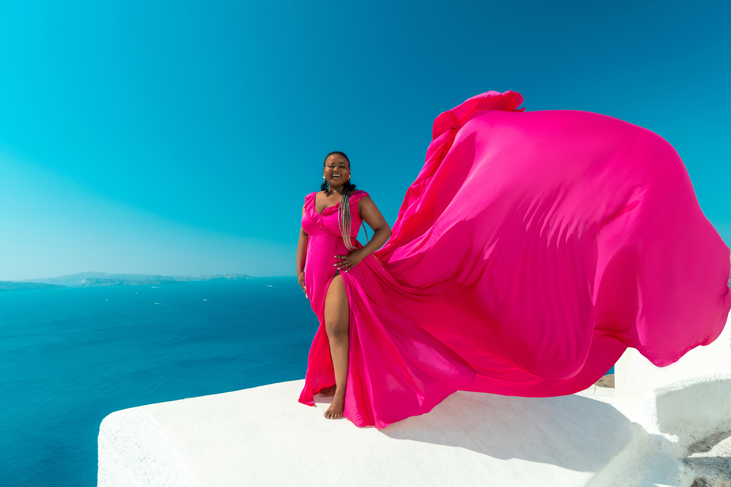 Capturing the Magic of Santorini: The Rising Trend of Flying Dress. Photographer in Santorini SokoLOVE Alex| Flying Dress Santorini