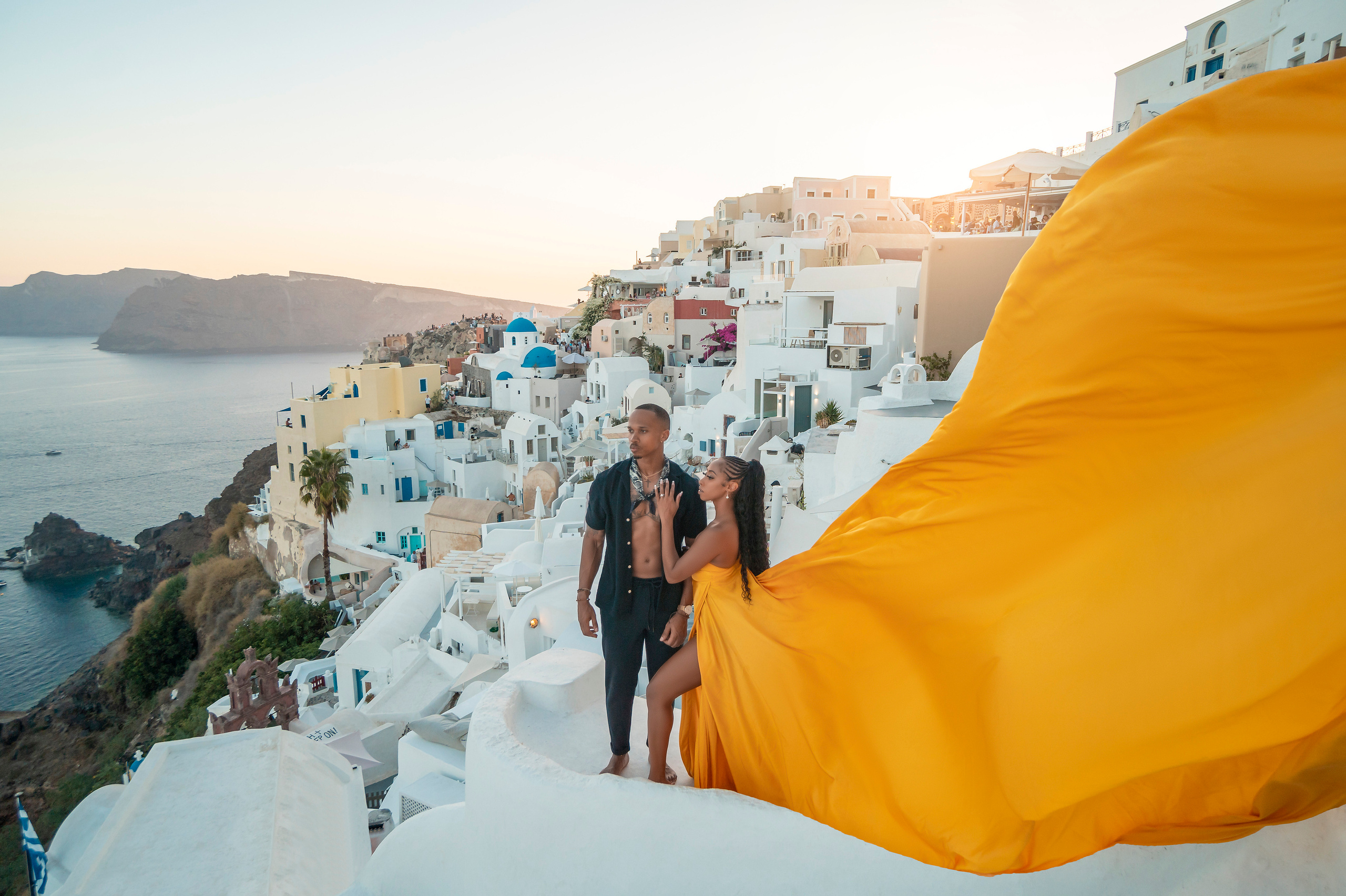 How to choose a photographer for couples in Santorini. Photographer in Santorini SokoLOVE Alex| Flying Dress Santorini