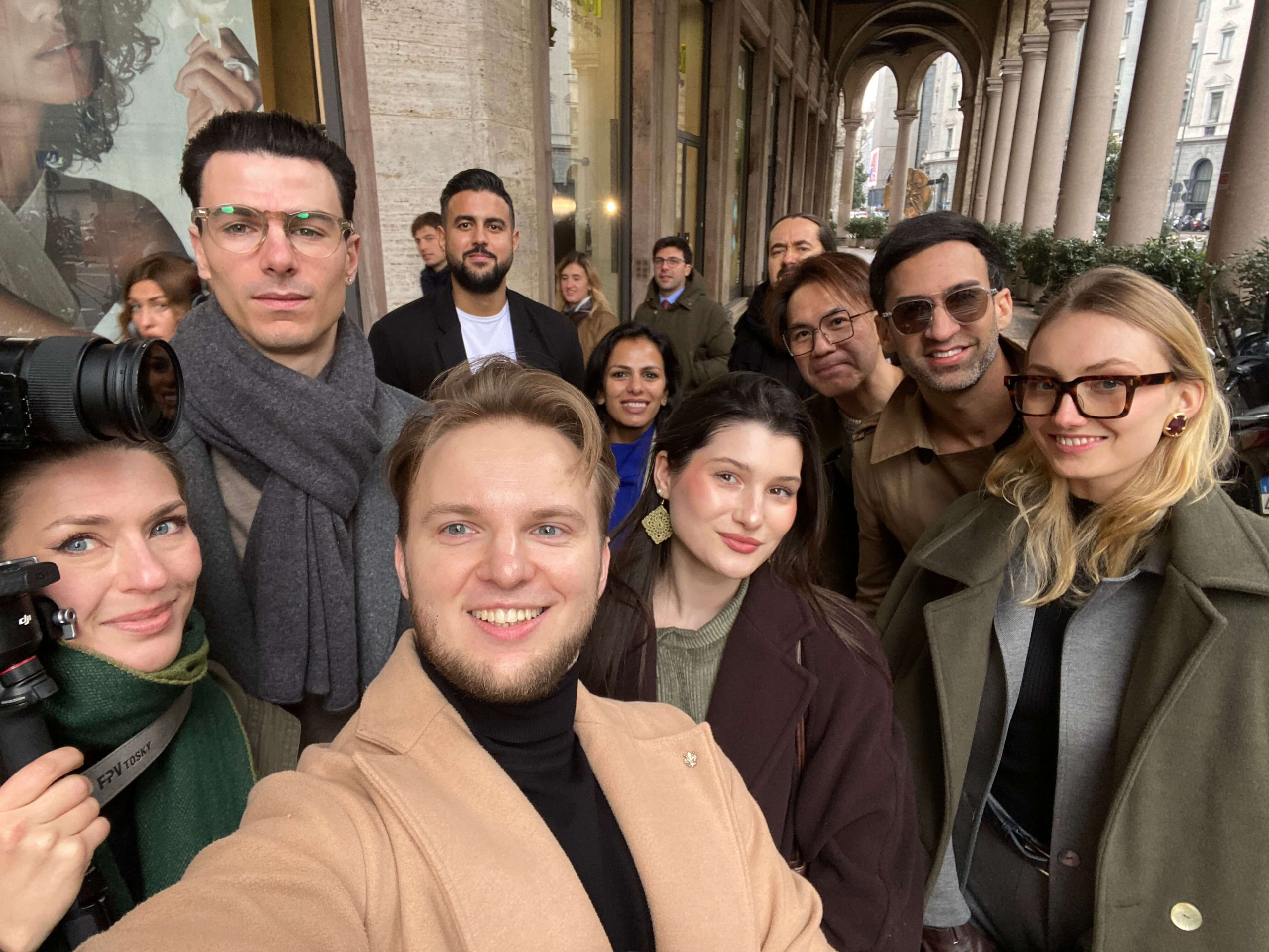 Behind-the-scenes group photo with the production team and models from the eyewear brand photoshoot in Milan