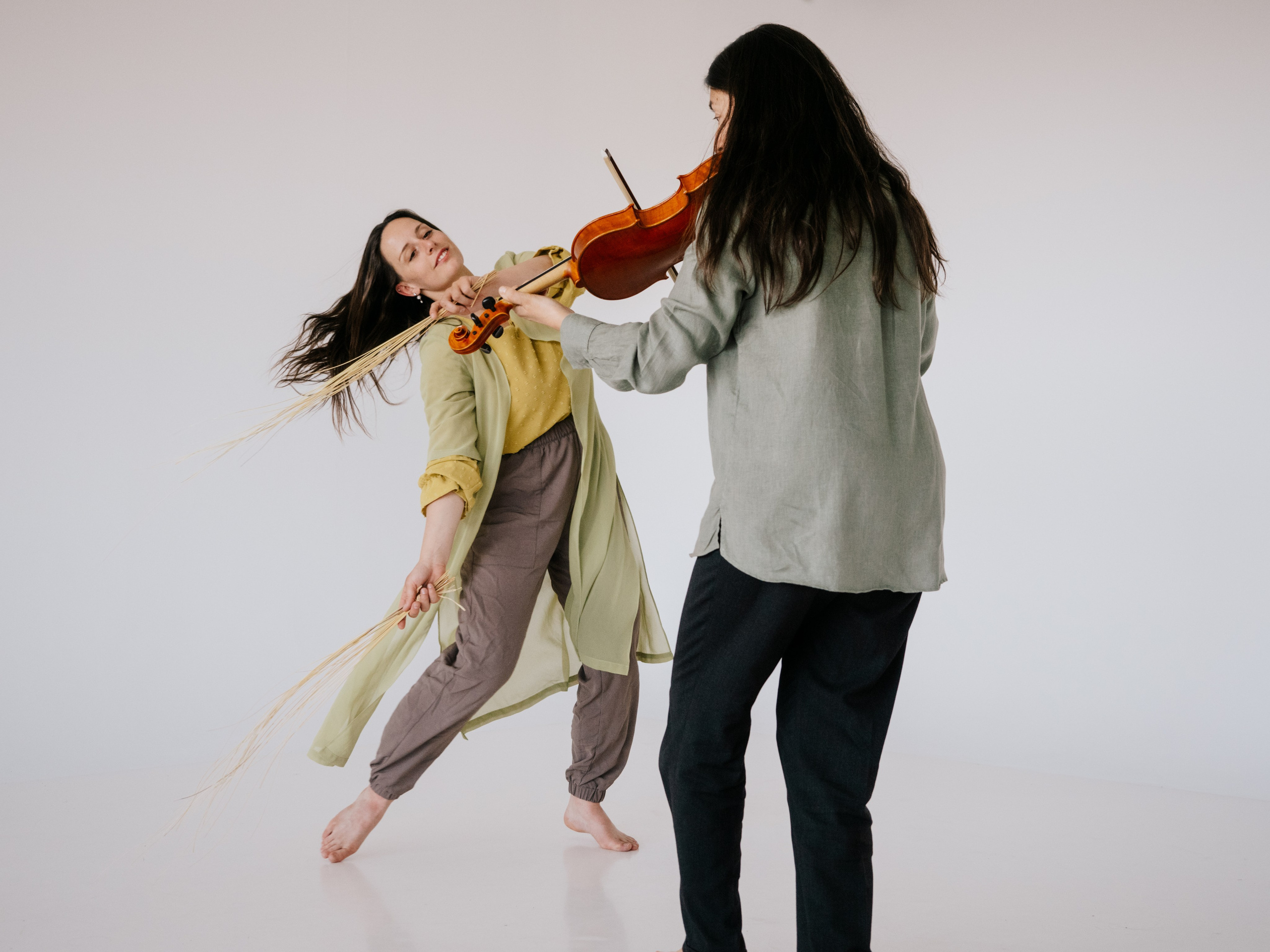 Dynamic photo of two artists performing.