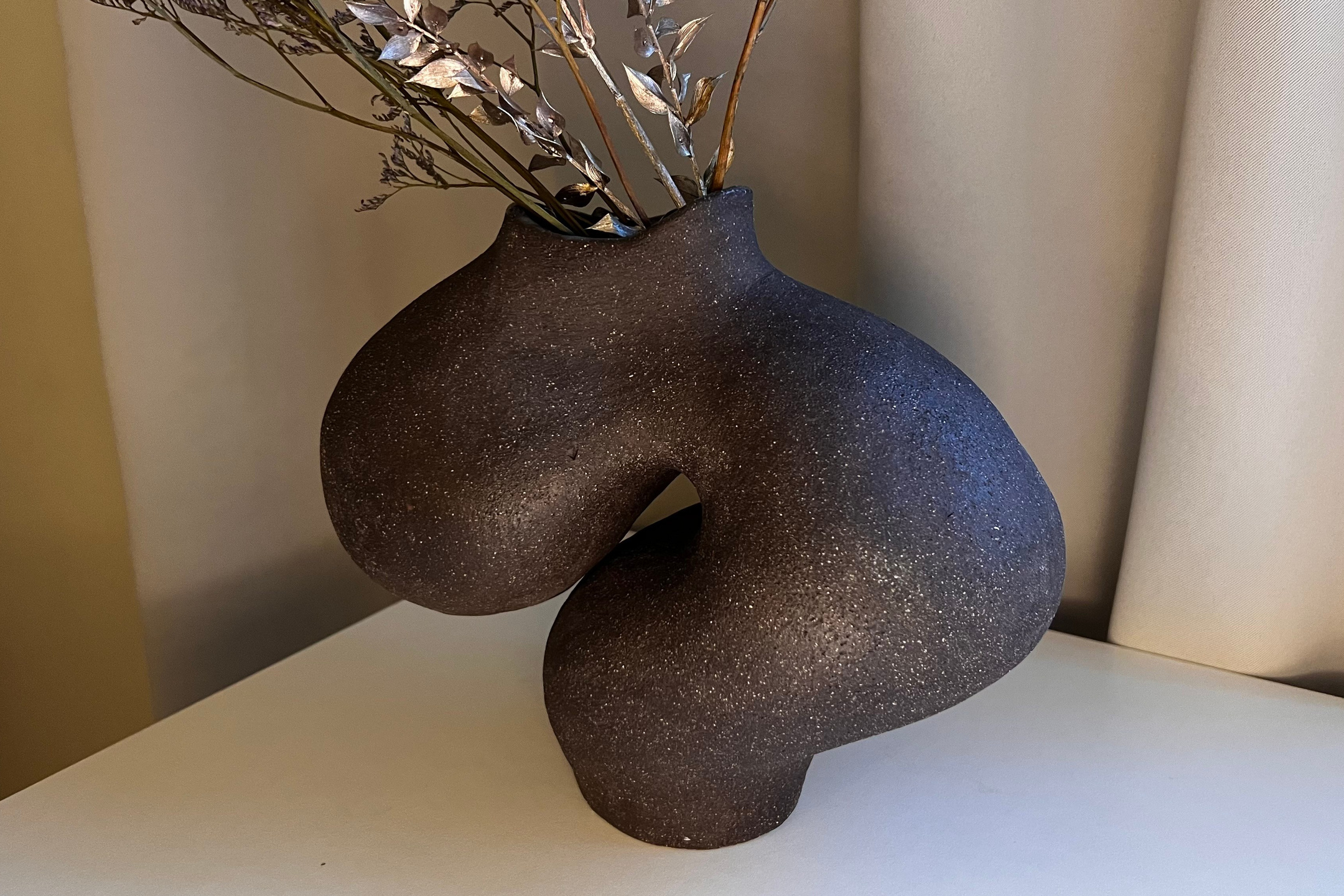 beautiful handmade ceramic vase on the table