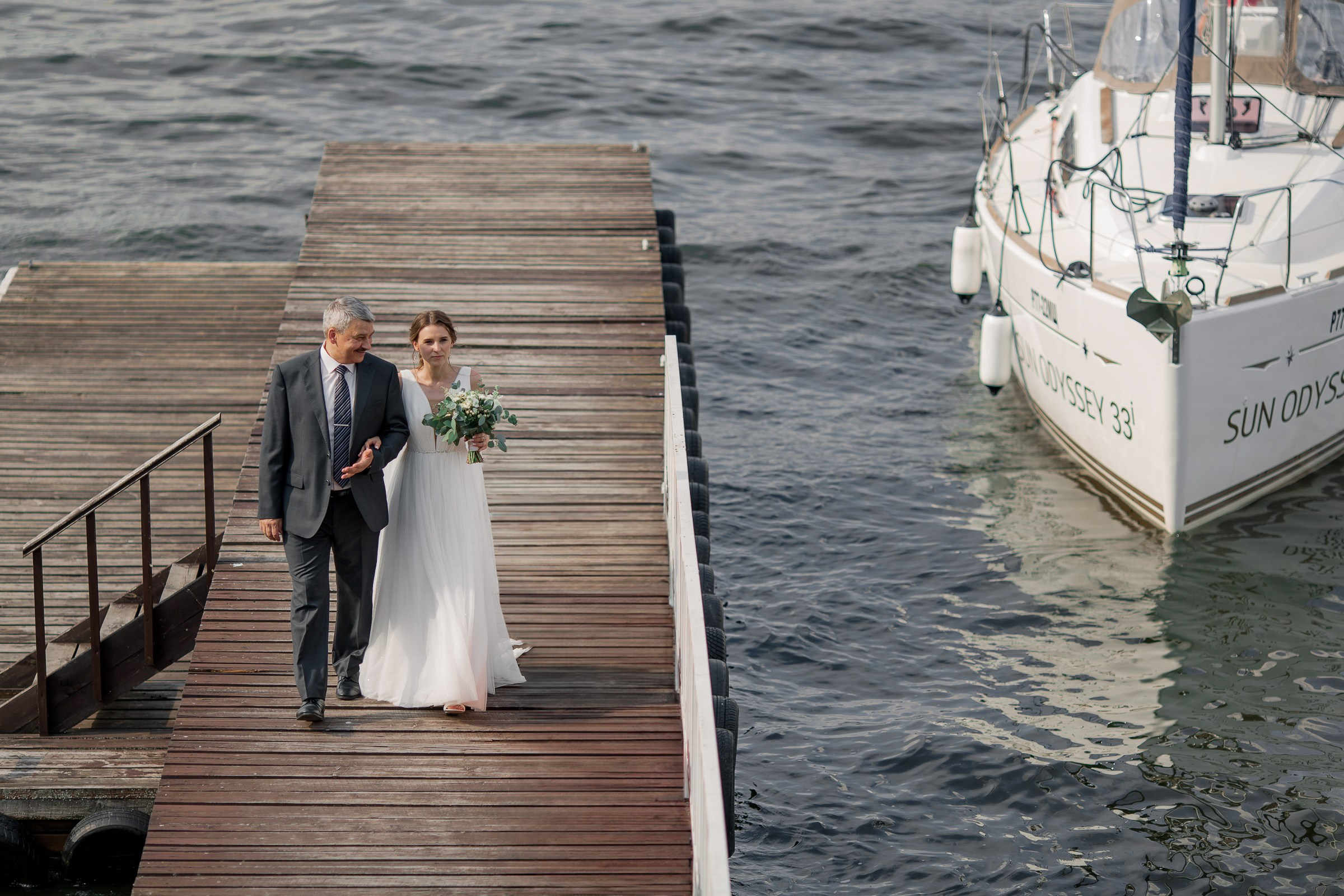 Bride walking down aisle, by Bude, Cornwall reportage wedding photographer.