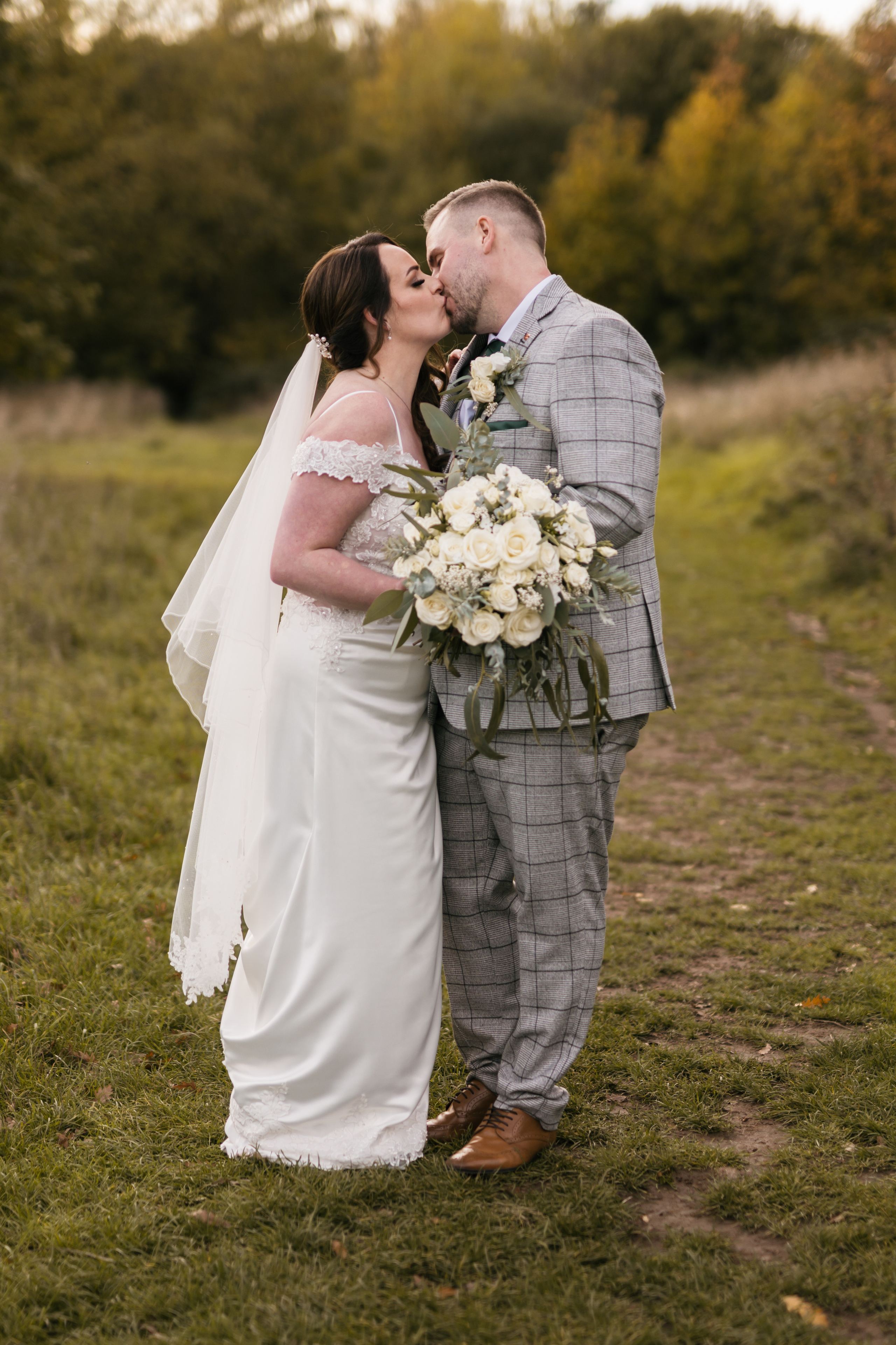 "Beautiful bride and groom pose in front of stunning Aston Hall in Sheffield, captured by your local wedding photographer"