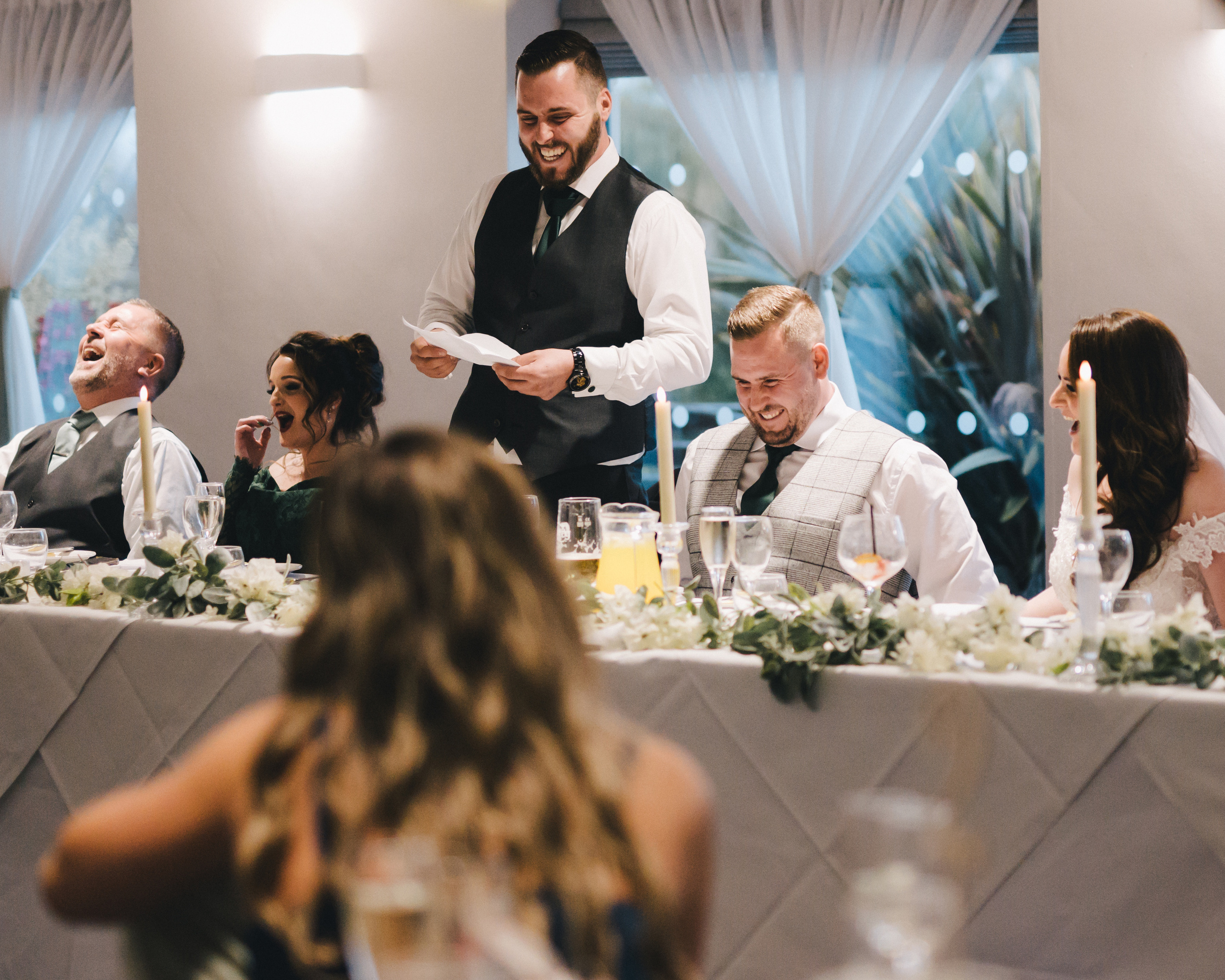 "Bride and groom looking blissful in front of Aston Hall, photographed by your nearby wedding photographer"