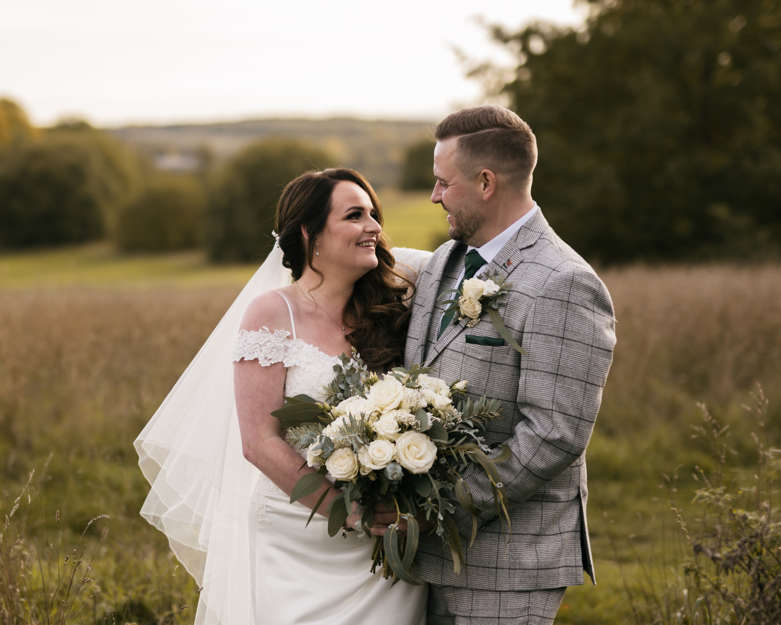 "Charming photo of couple enjoying a moment together at Aston Hall, captured by wedding photographer near you"