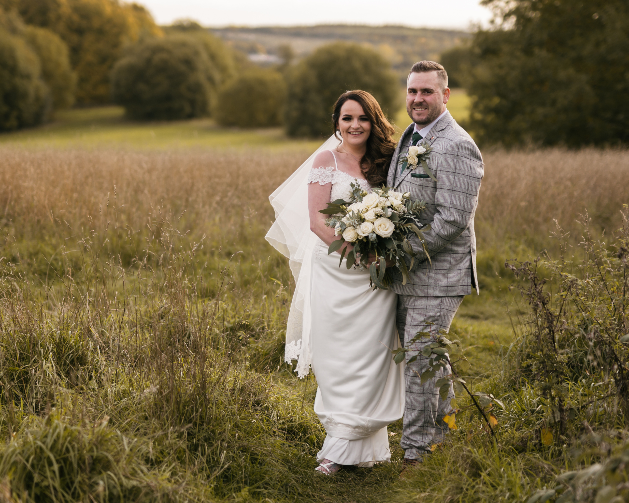 "Elegant bride and groom photographed in front of stunning Aston Hall by your nearby wedding photographer"