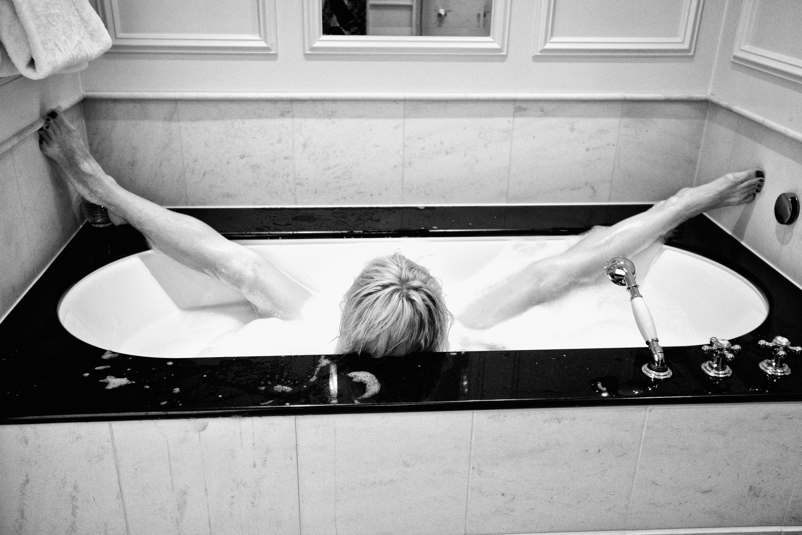 young beautiful woman in the bathtub