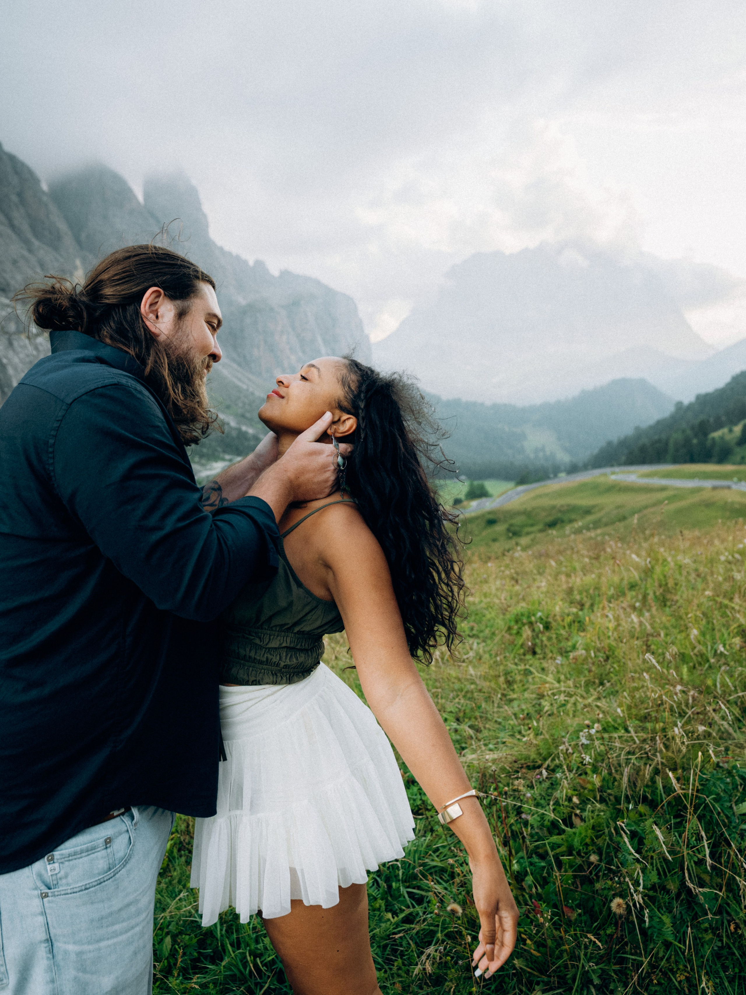 Romantic proposal at sunset with dramatic Dolomites and val Gardena scenery