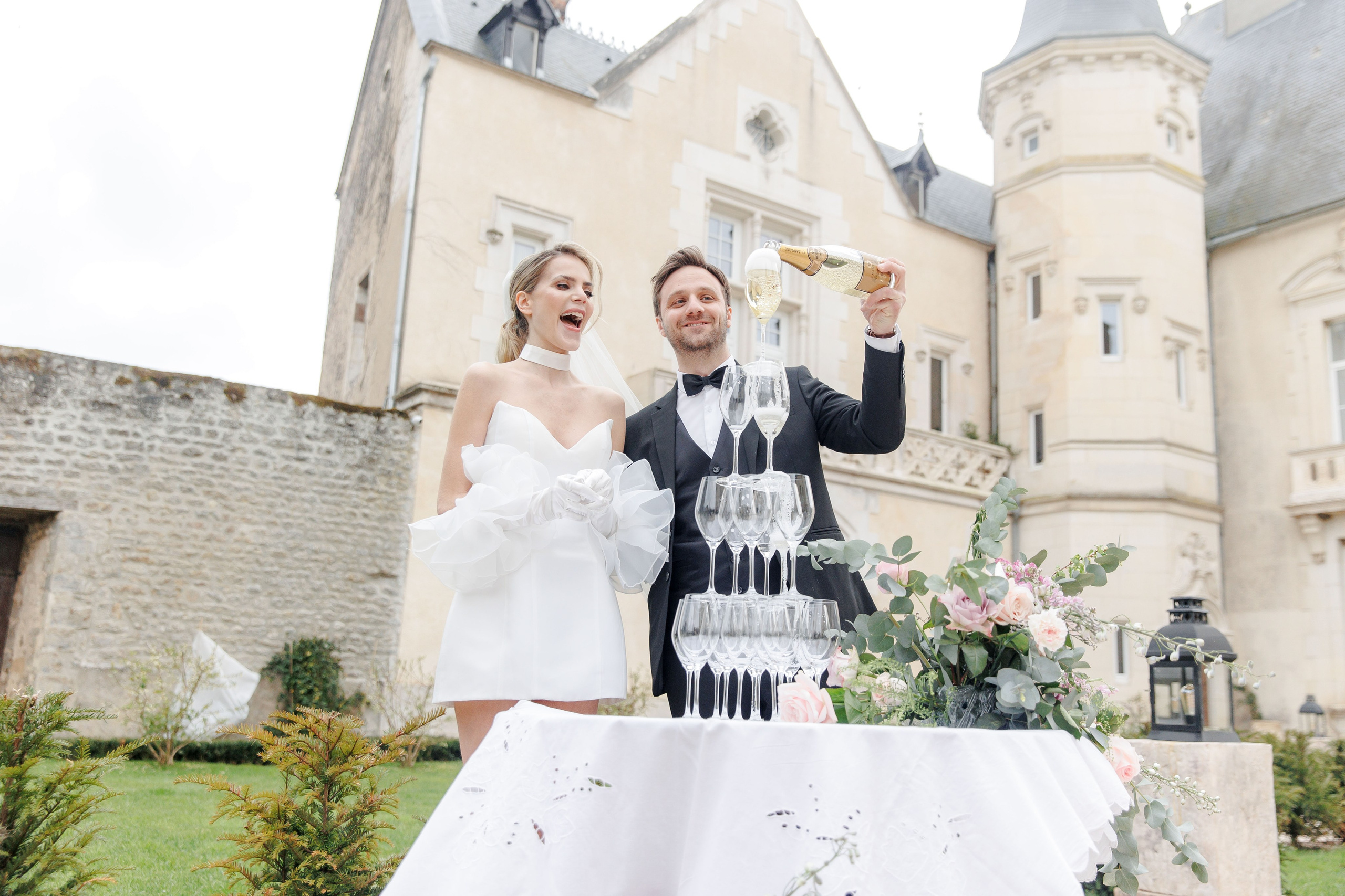 Candid wedding moment in France, capturing genuine emotions and joyful interactions.