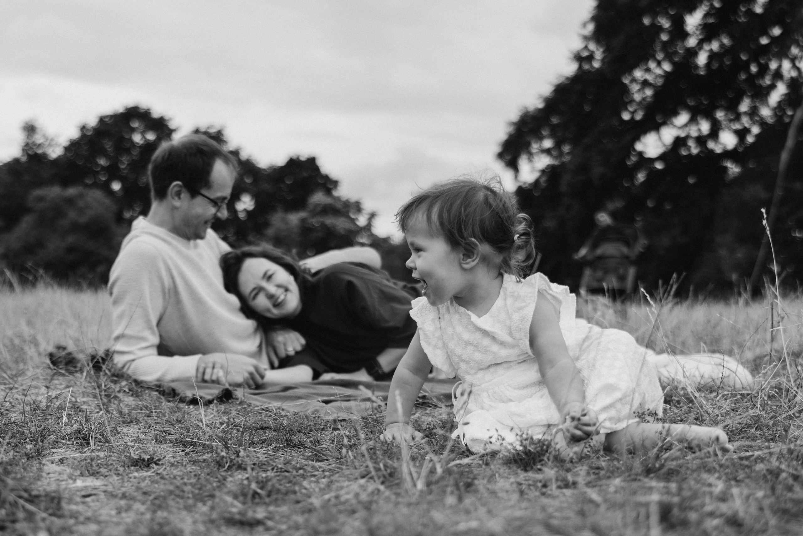 Milena with parents (Greenwich Park). Anastasia Klink, Photographer in London