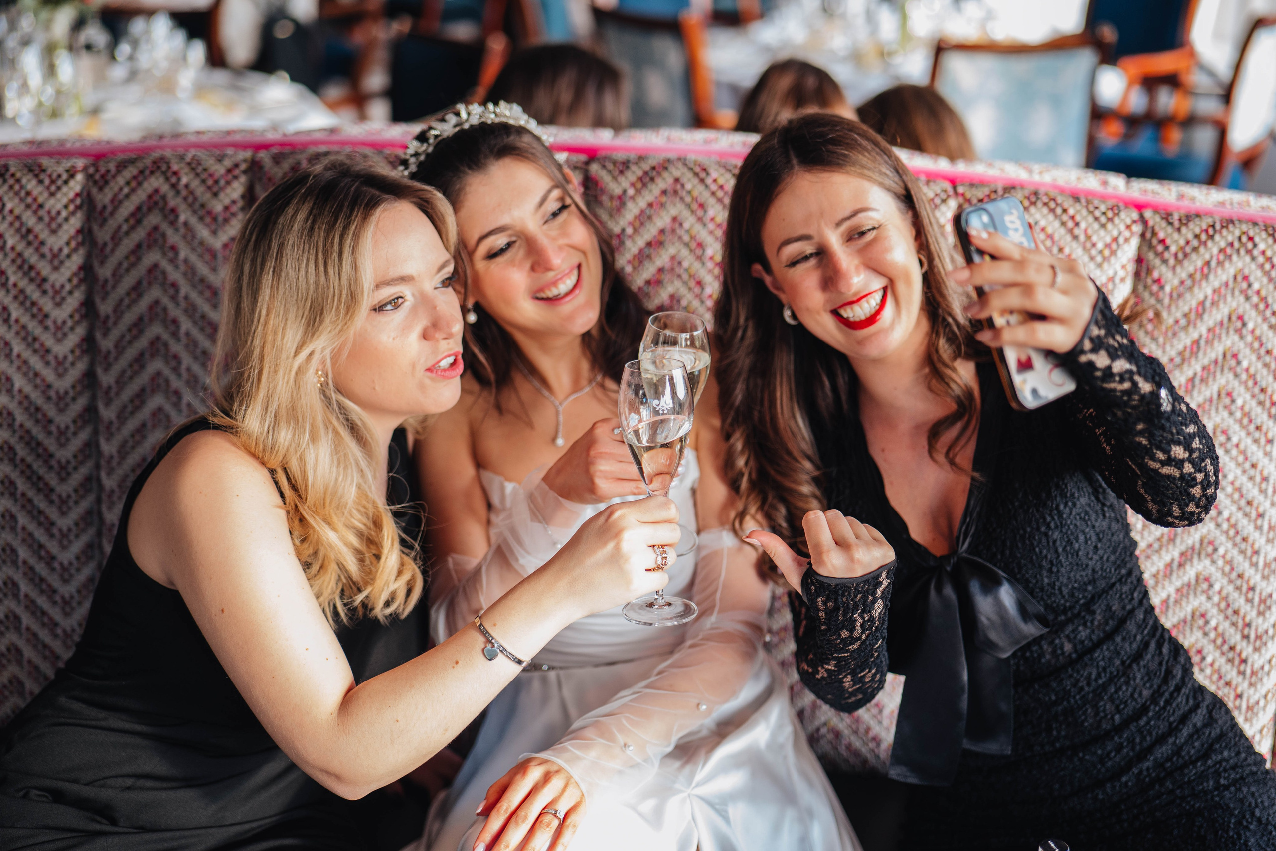 guests at the wedding having fun and making selfies