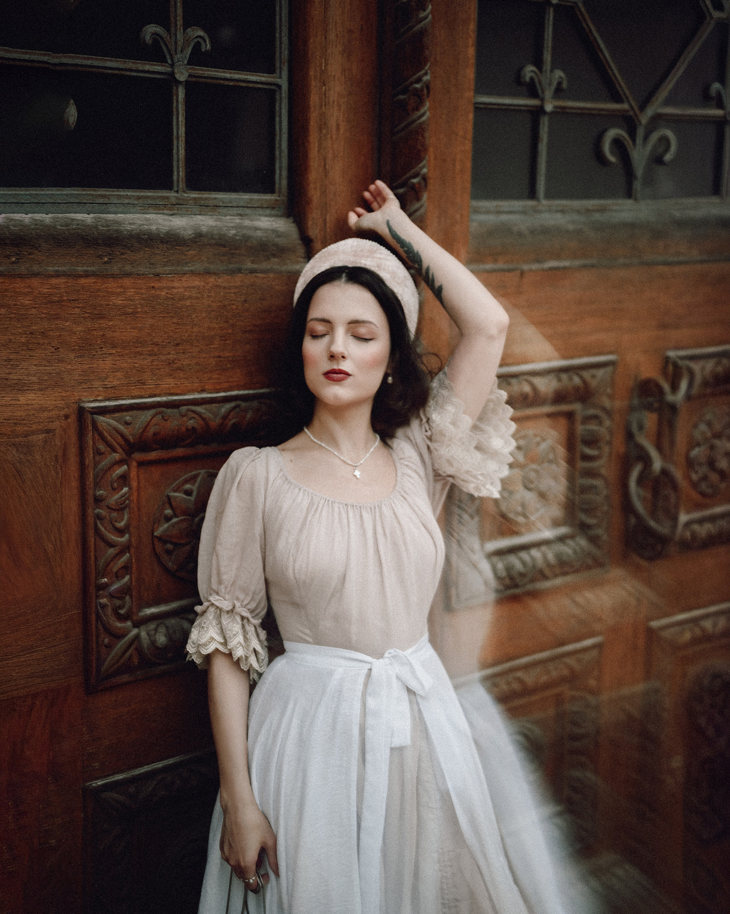 Slavic folklore shoot in traditional headwear and white dress. Moth & Moss Photography