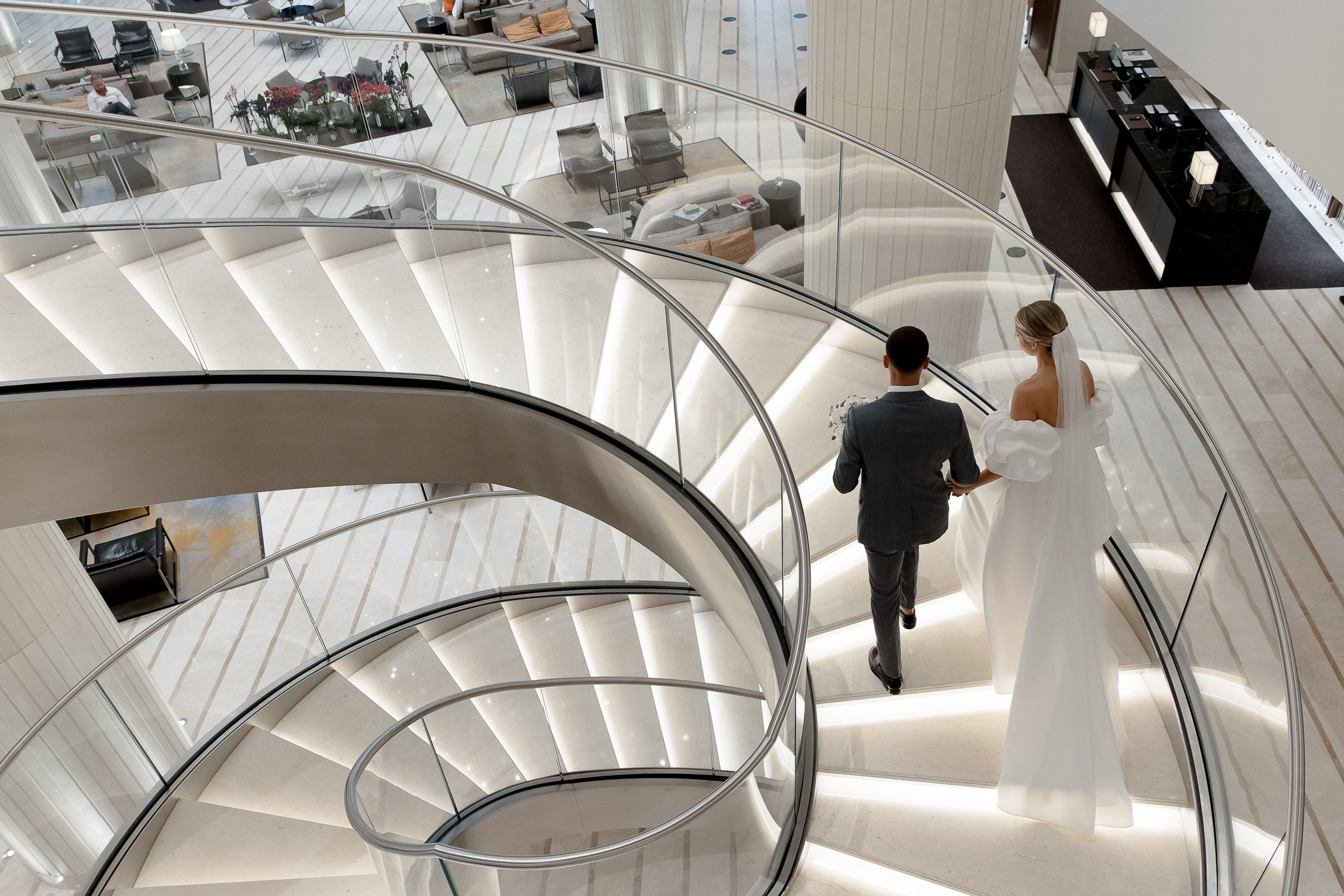 Bride and groom staircase portrait, by Bude wedding photographer.