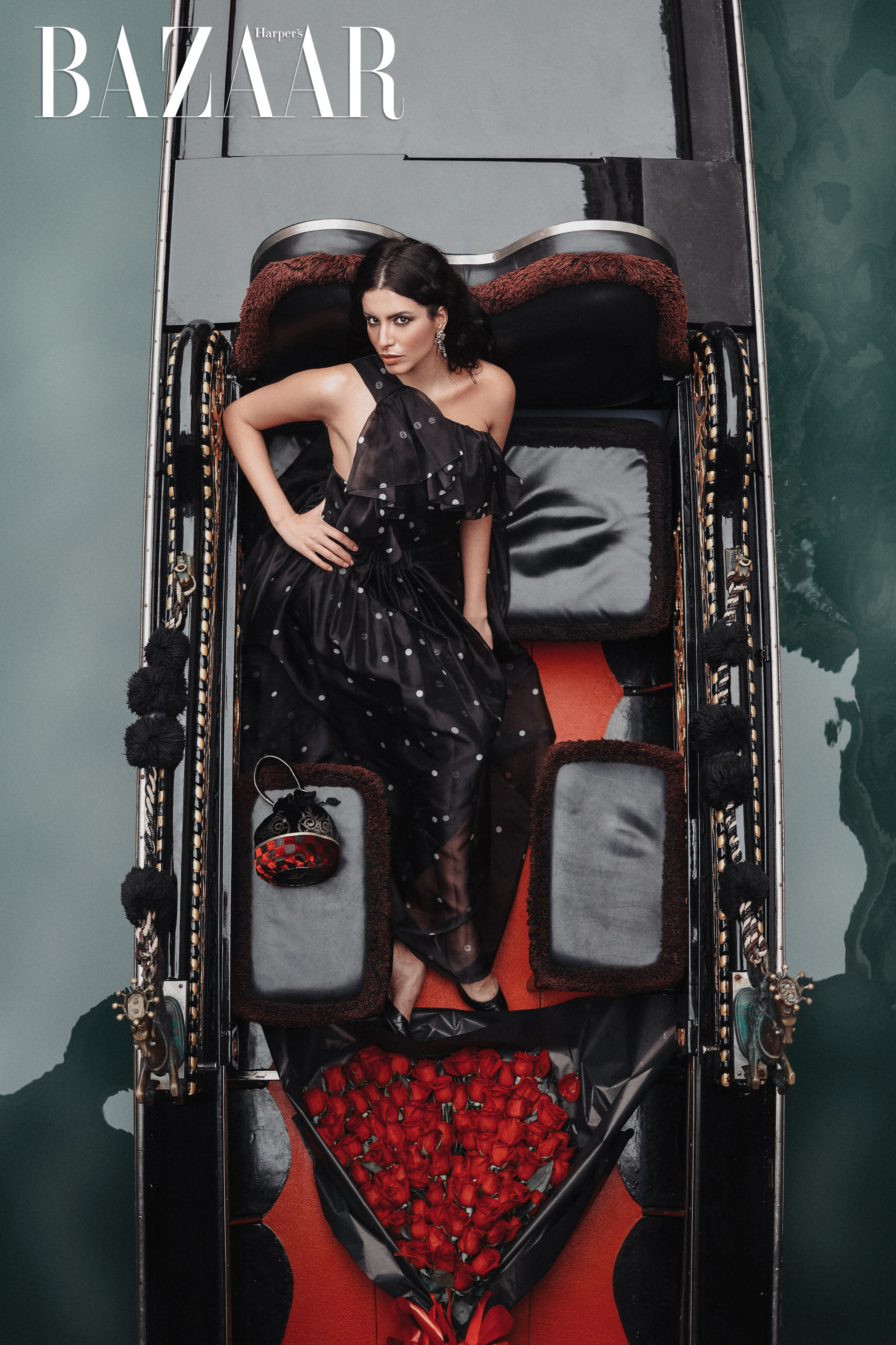 girl lies in a gondola, photo from above
