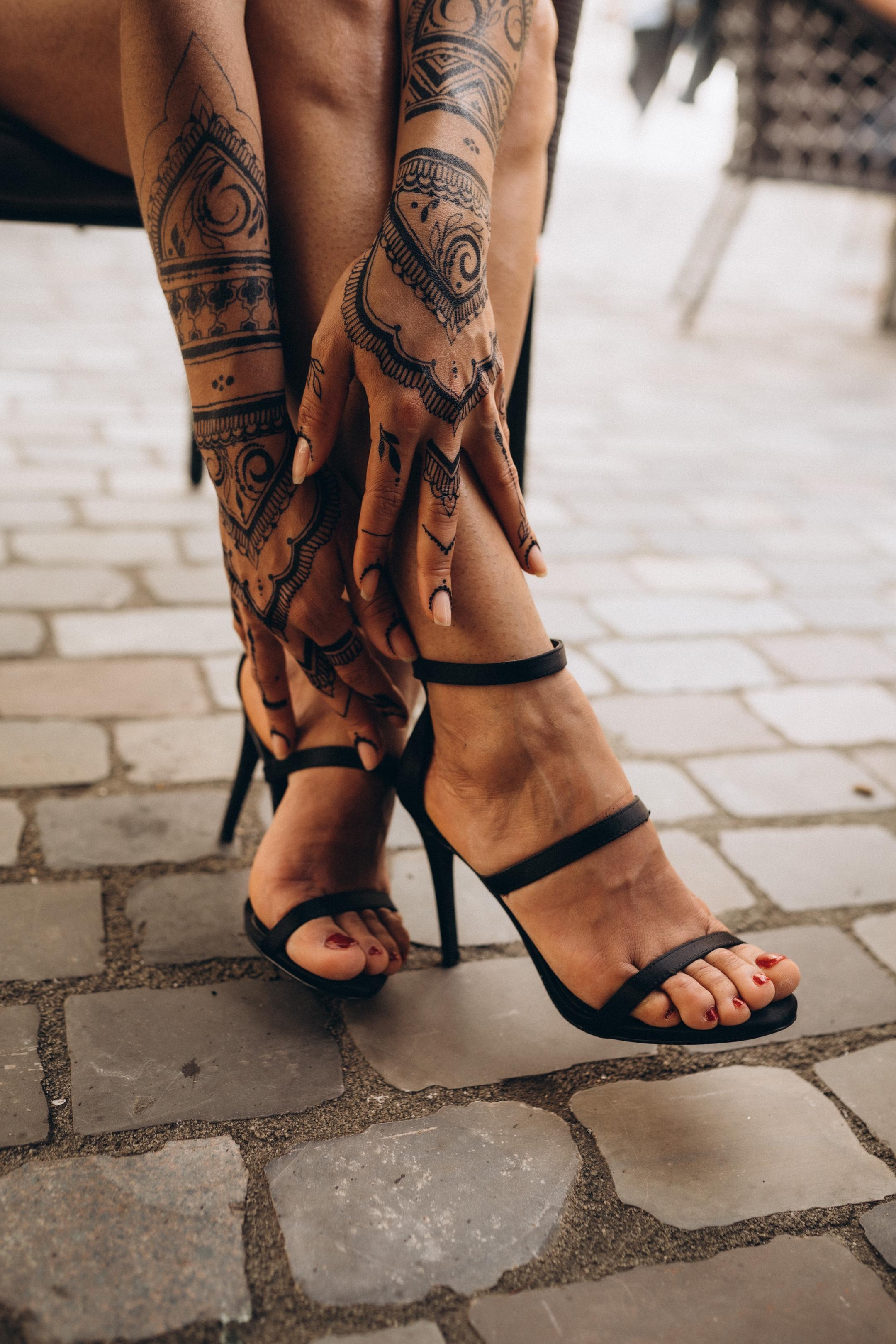 Henna bodyart on arms ad hands