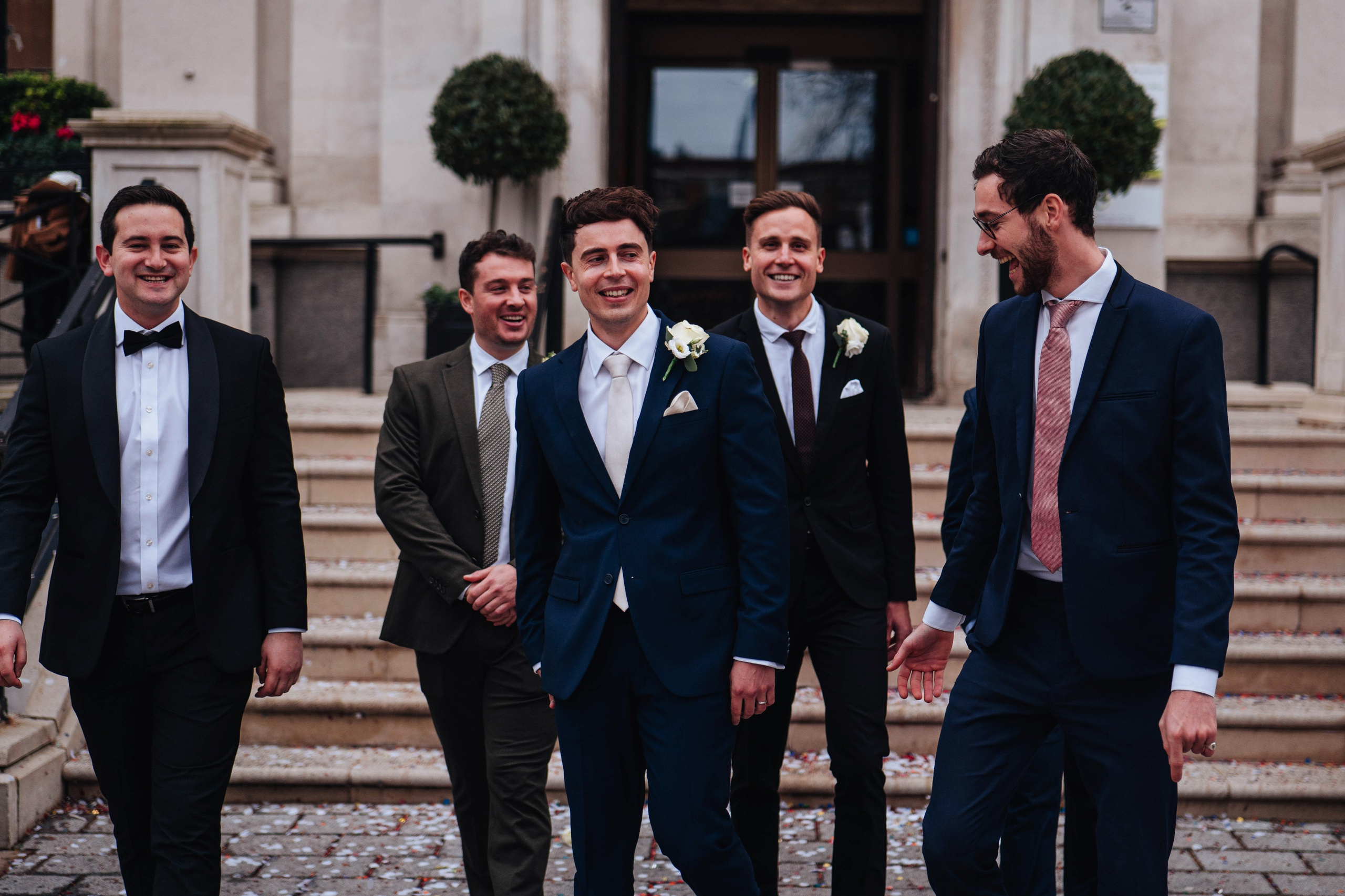 Exit from Islington town hall, meeting the couple with confetti, group photo