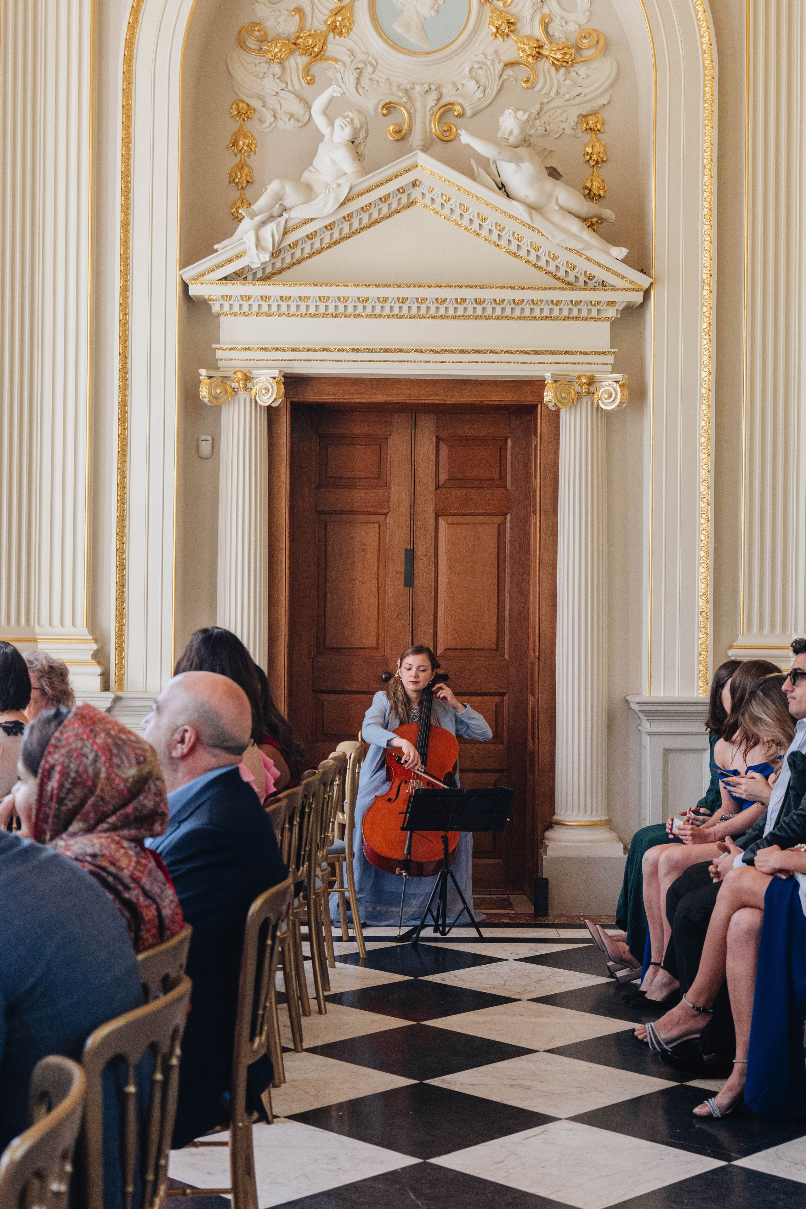 musician at the wedding venue playing music before the ceremony