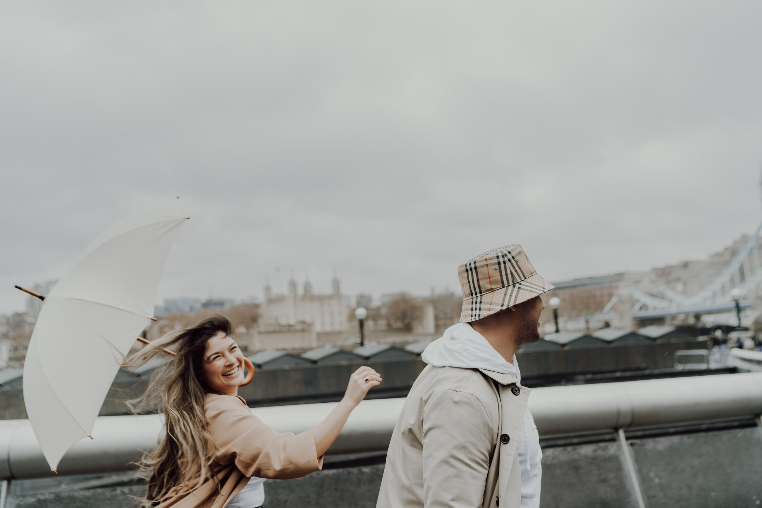 Rainy photo walk by Tower Bridge. London portrait and family photographer