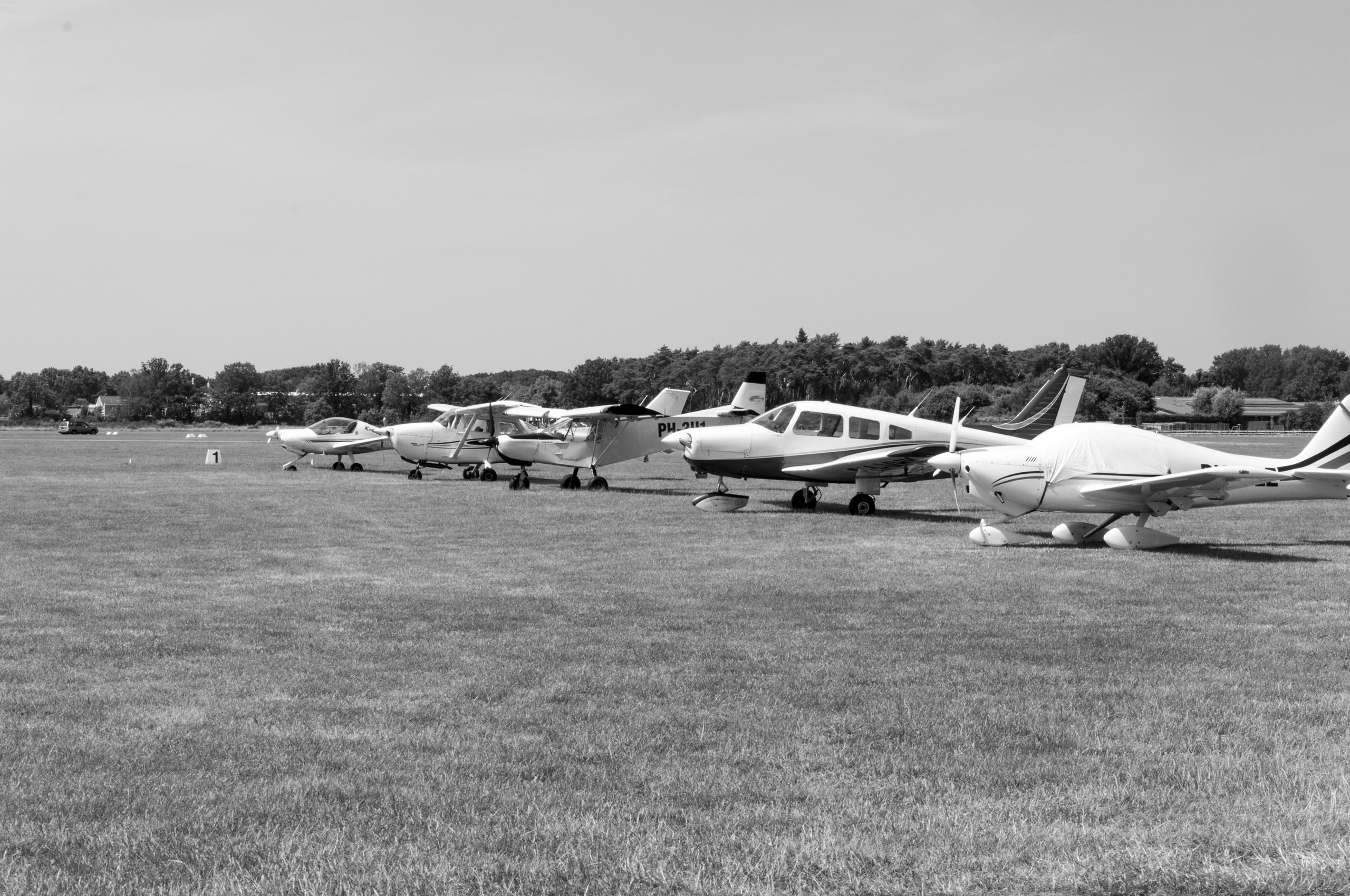 A photoshoot of a pilot and planes. Éclat Photos. Exclusive portrait photography service