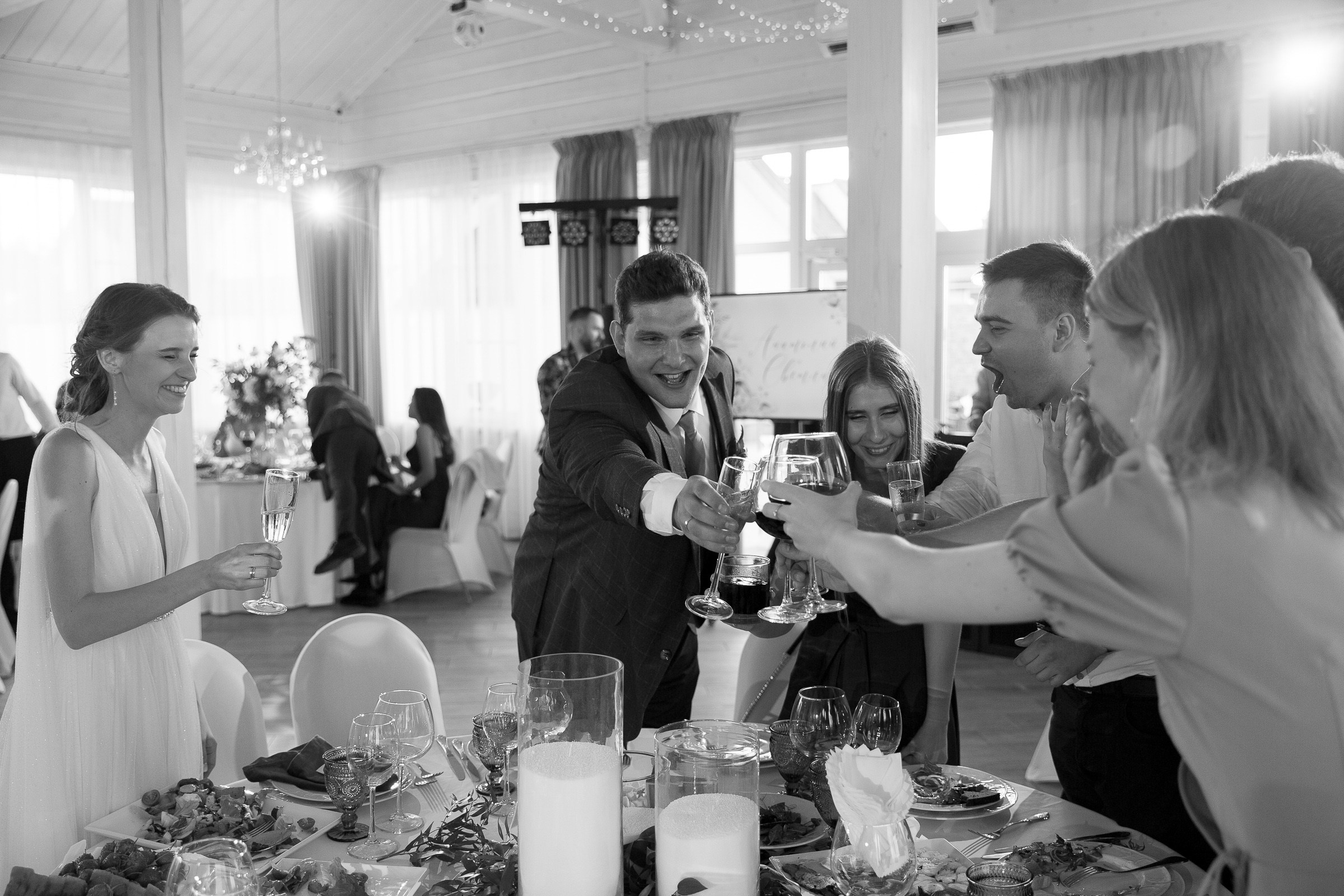 Drinks toasting, by Cornwall editorial photographer.