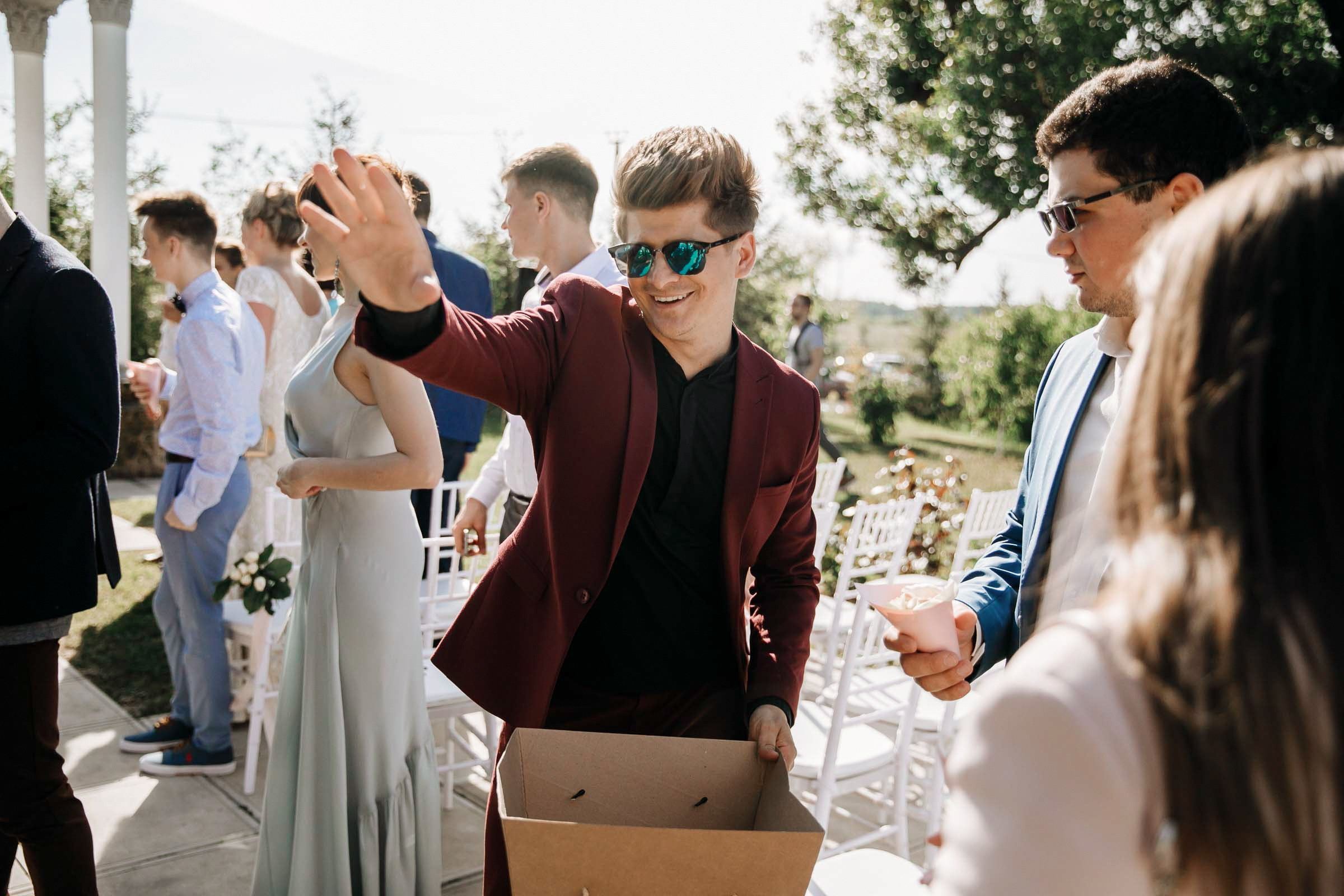 Guests after ceremony, by Tanya Bodgan, Cornwall wedding photography.