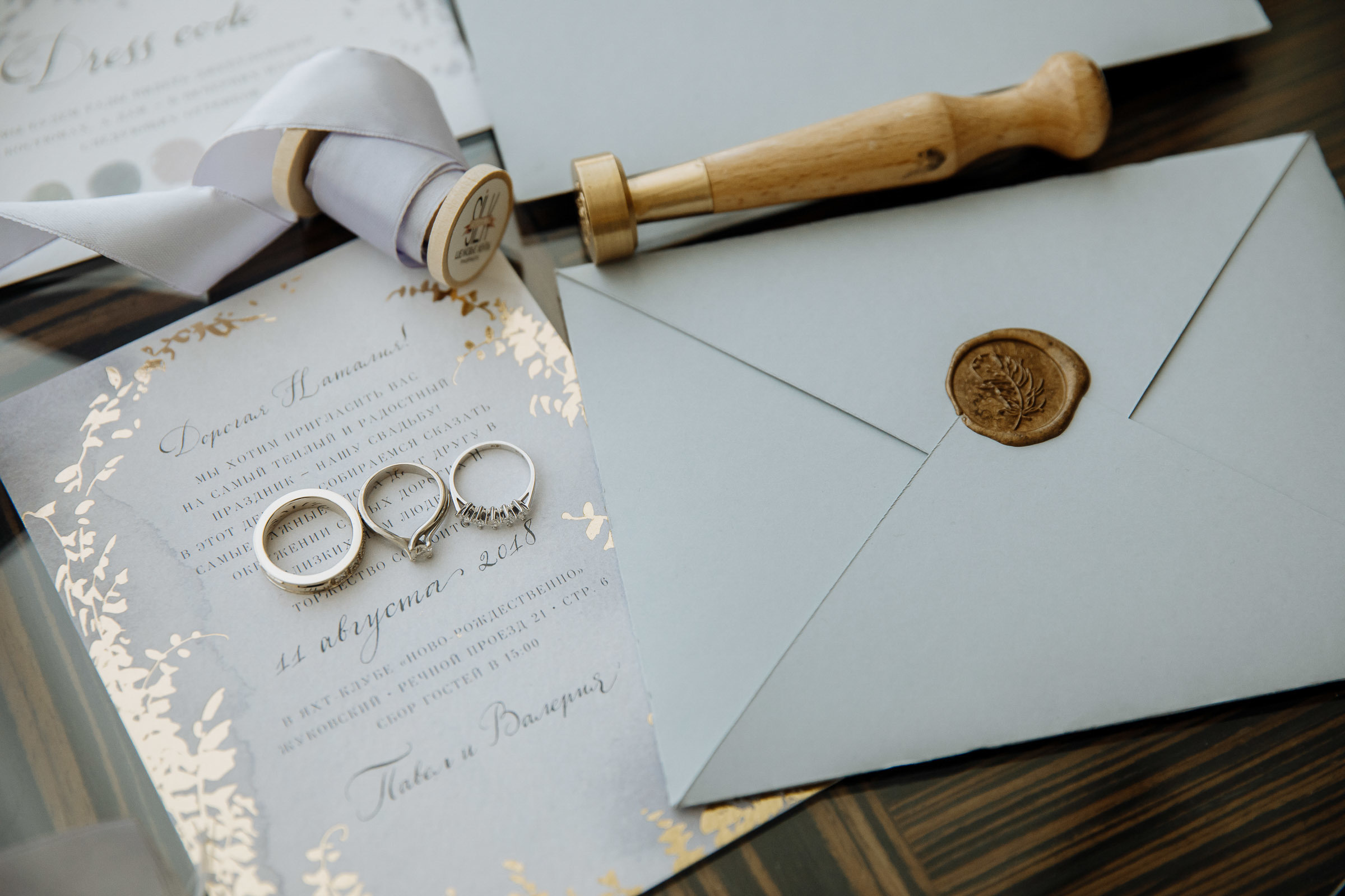 Rings and letter from groom close up, by Tanya Bogdan, Bude editorial wedding photographer.  