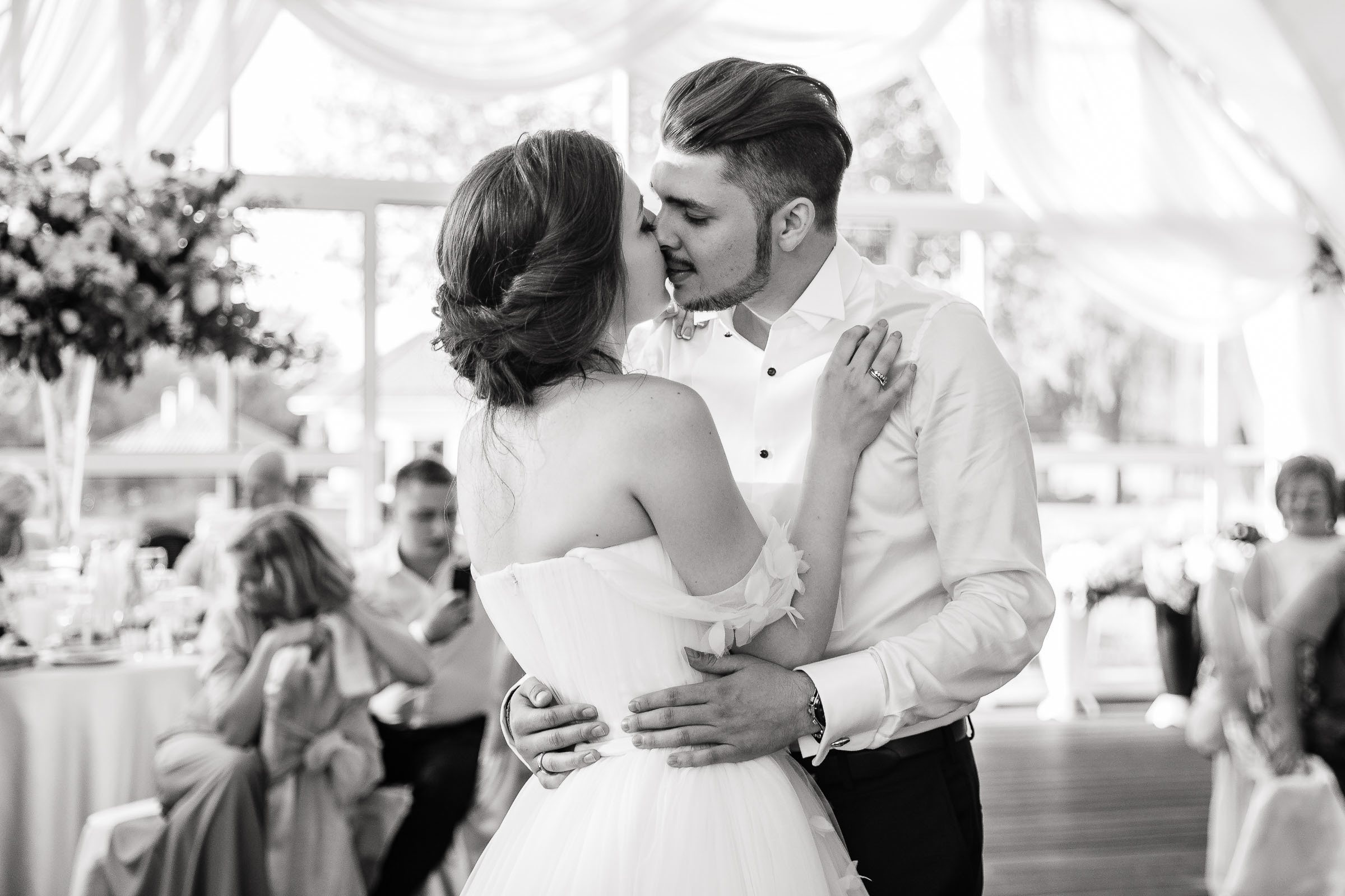 Couple’s first dance under marquee in black and white, by Tanya Bogdan, Cornwall wedding photographer.  