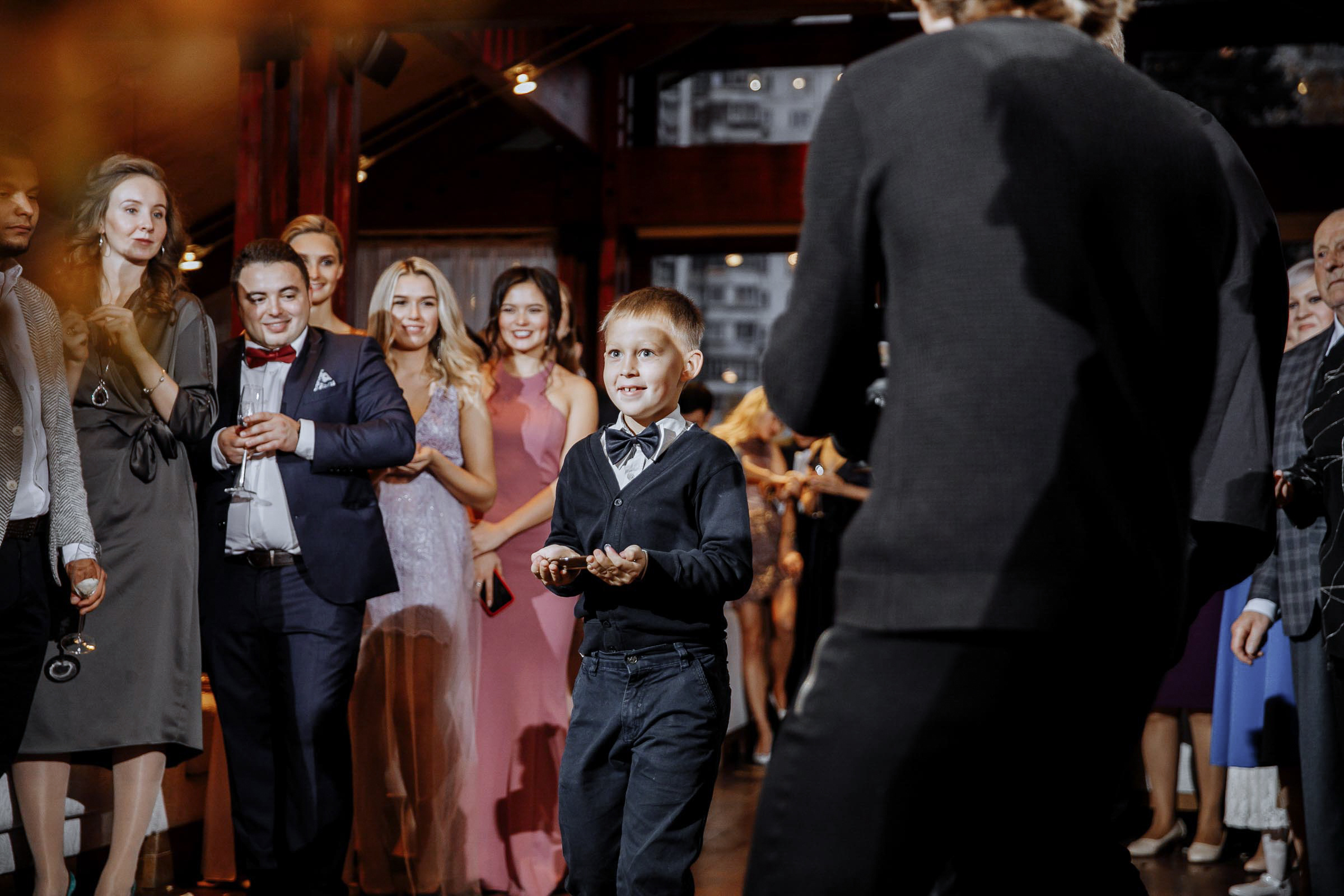 Wedding ring boy in indoor light, by Tanya Bodgan, Bude, Cornwall wedding photography.  