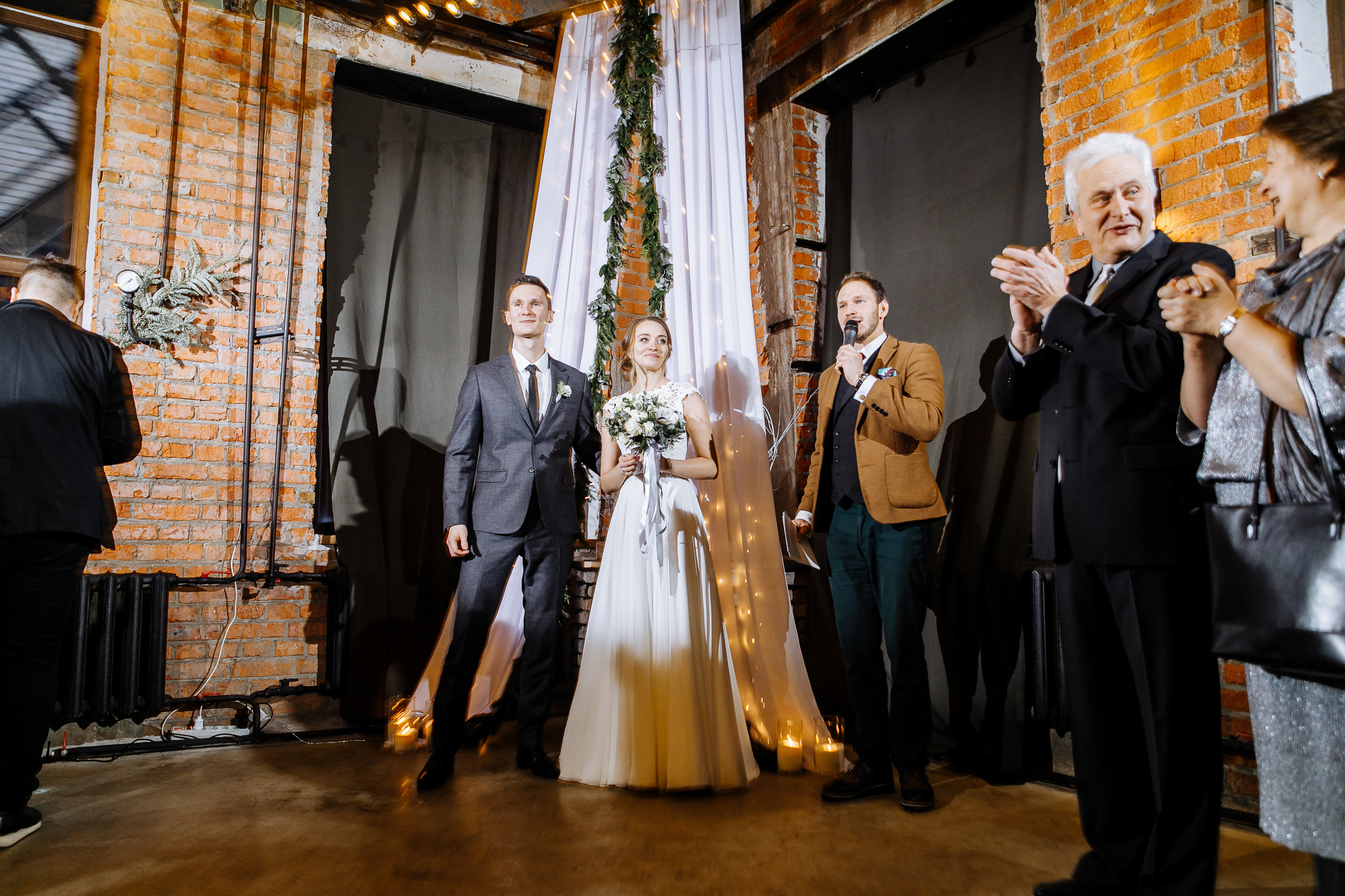 Guests applaud at city ceremony venue, by Tanya Bogdan, Newquay wedding photography.  