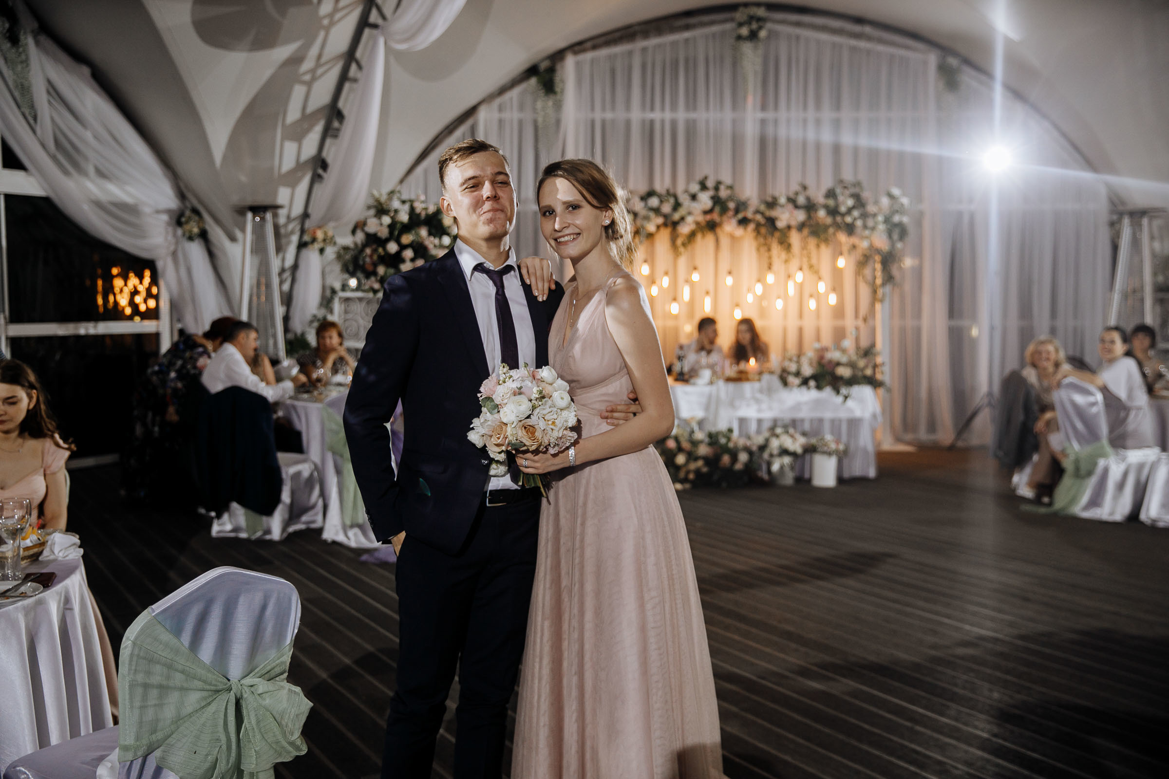 Bridesmaid with partner, by Tanya Bogdan, Bude wedding photography.  