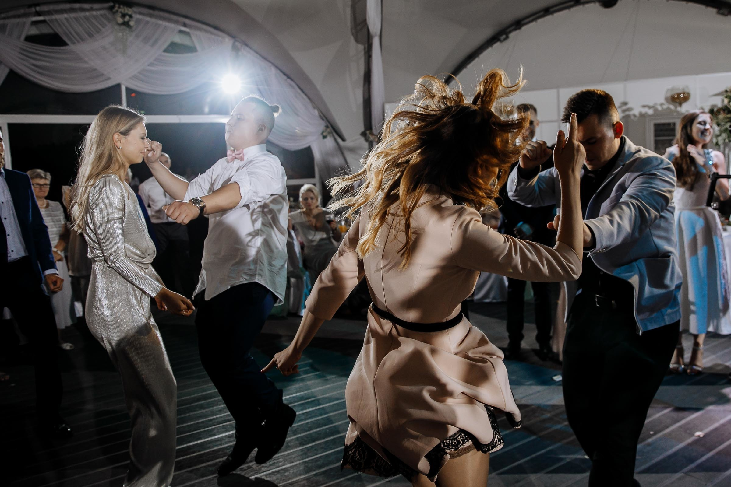 Dancing action, by Tanya Bogdan, Cornwall wedding photographer.