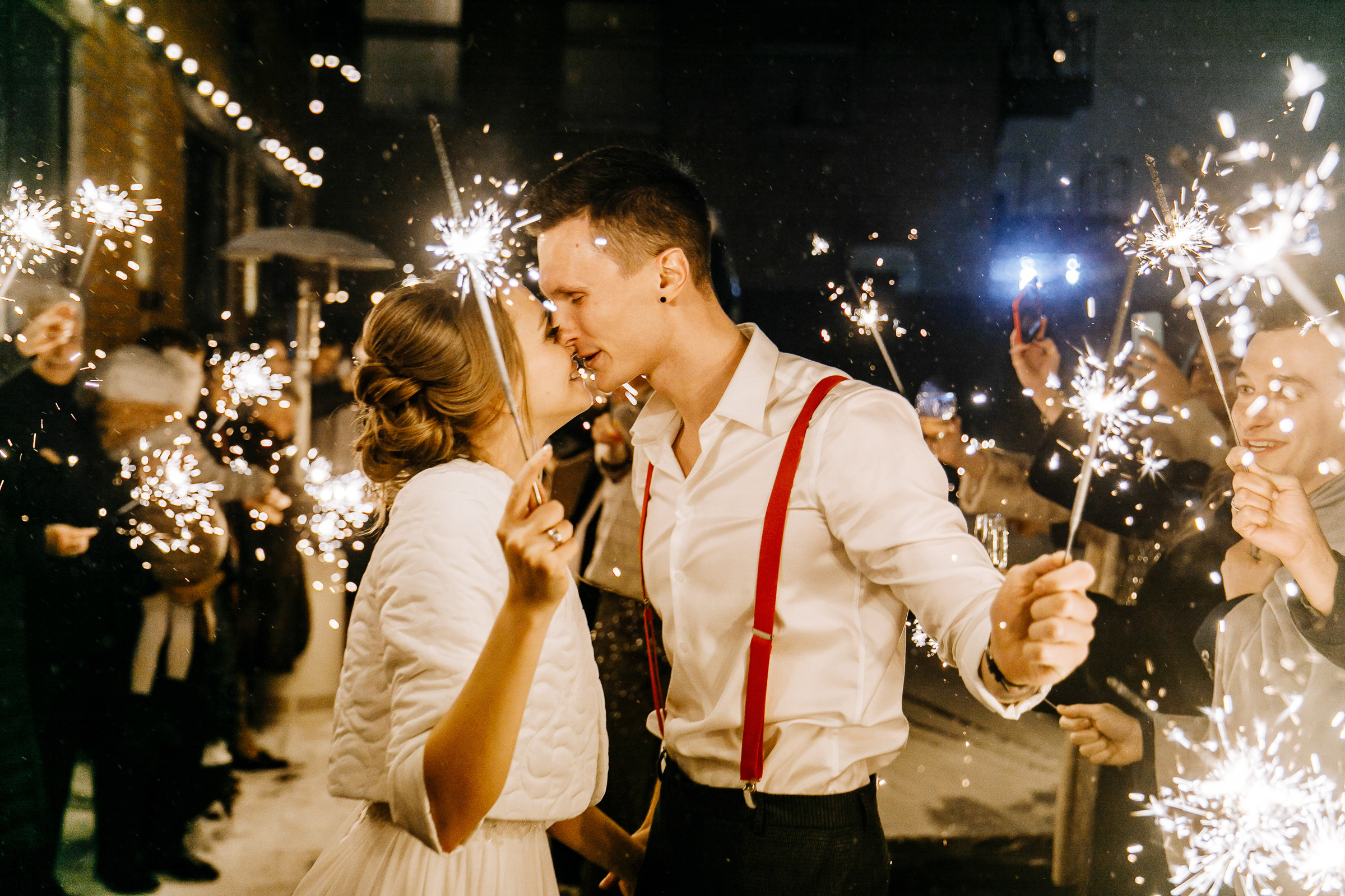 Couple with sparklers kissing close up, by Tanya Bogdan, Newquay wedding photography.  