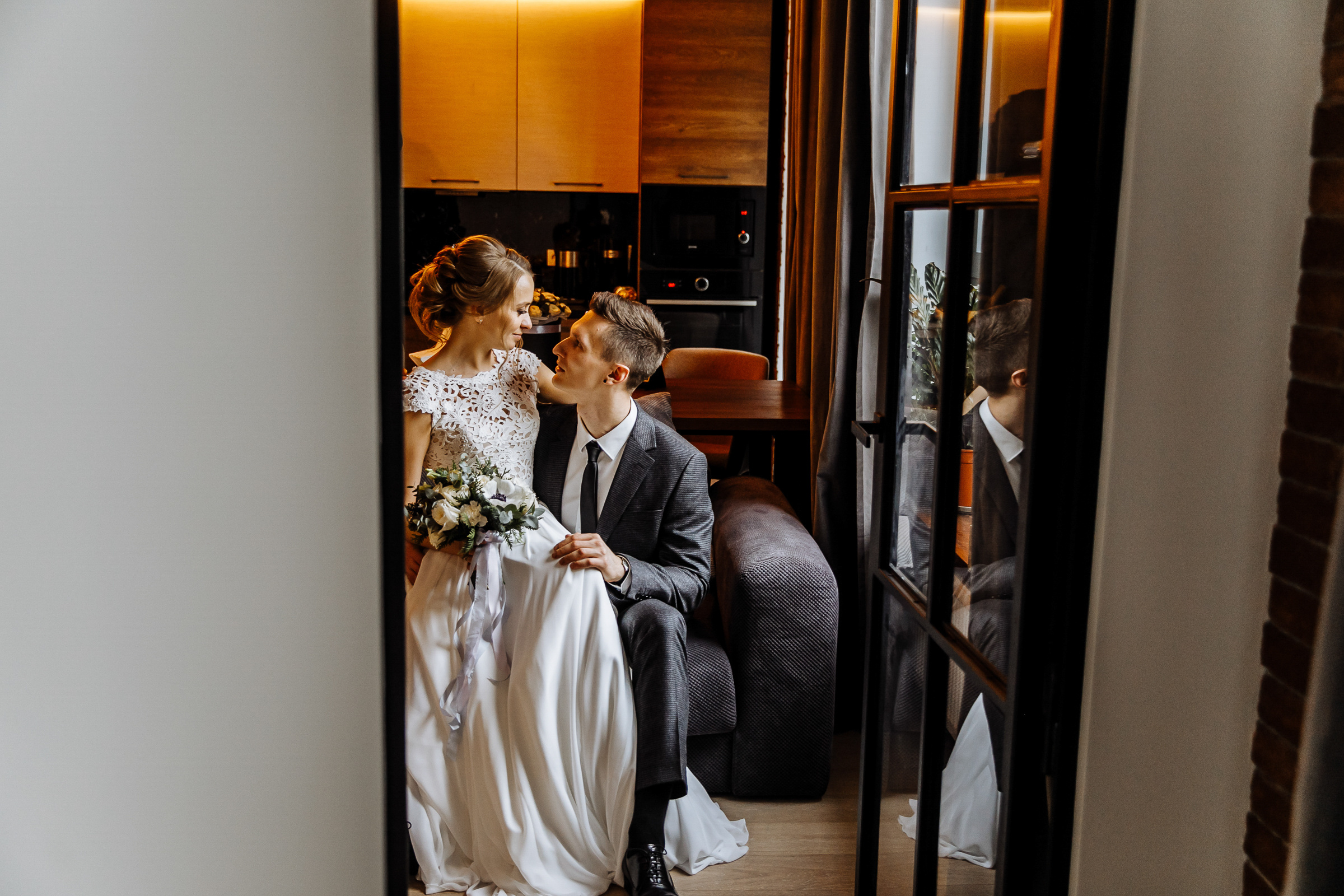 Couple’s portrait in home living room, by Tanya Bogdan, St Ives wedding photography.  