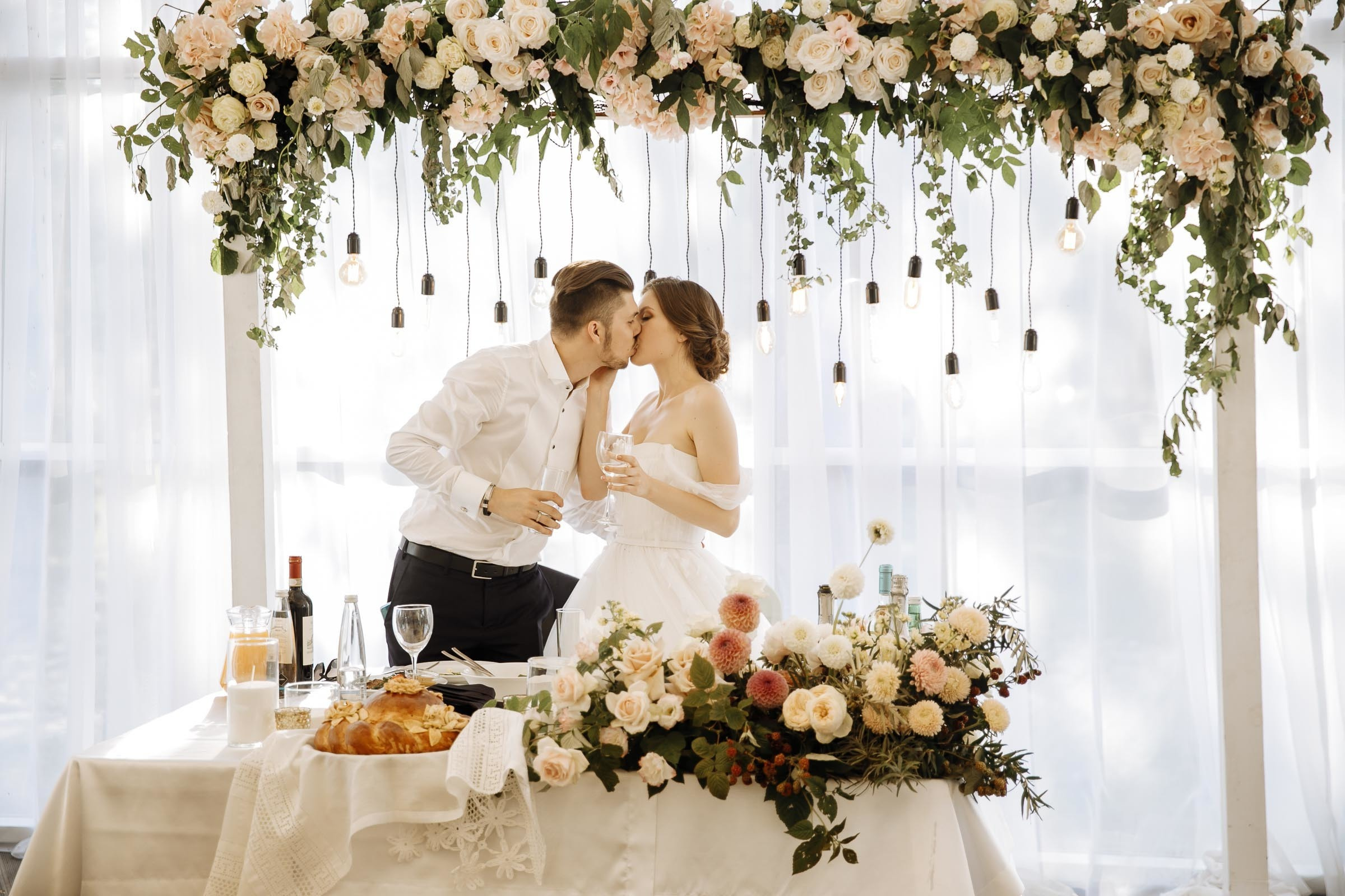 Couple at top table, by Tanya Bogdan, Bude, Cornwall wedding photographer.  