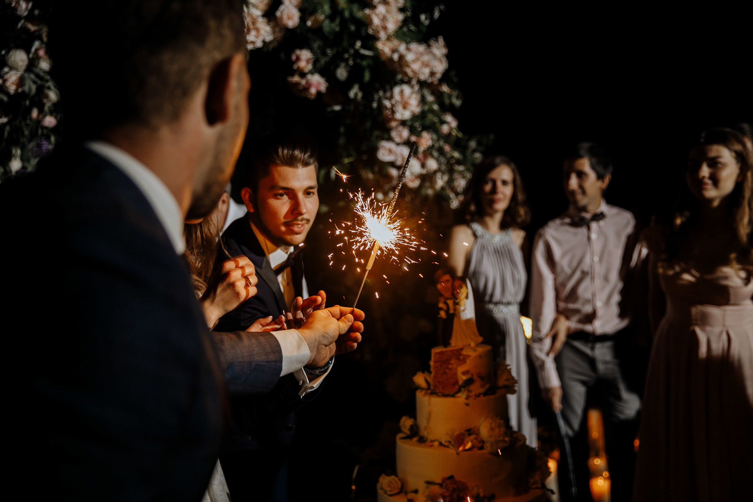 Sparklers by the cake, by Tanya Bogdan, Bude editorial and reportage wedding photography.  