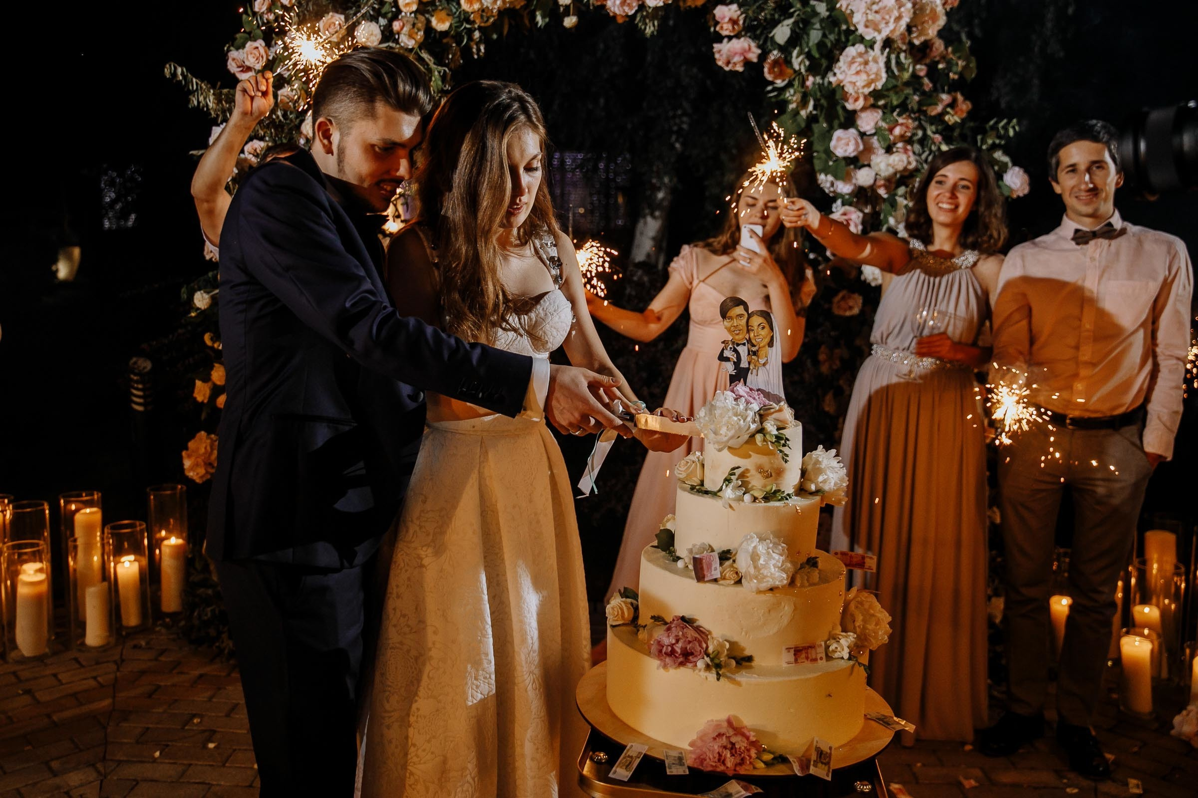The cake cut, by Tanya Bogdan, Bude editorial and reportage wedding photography.  
