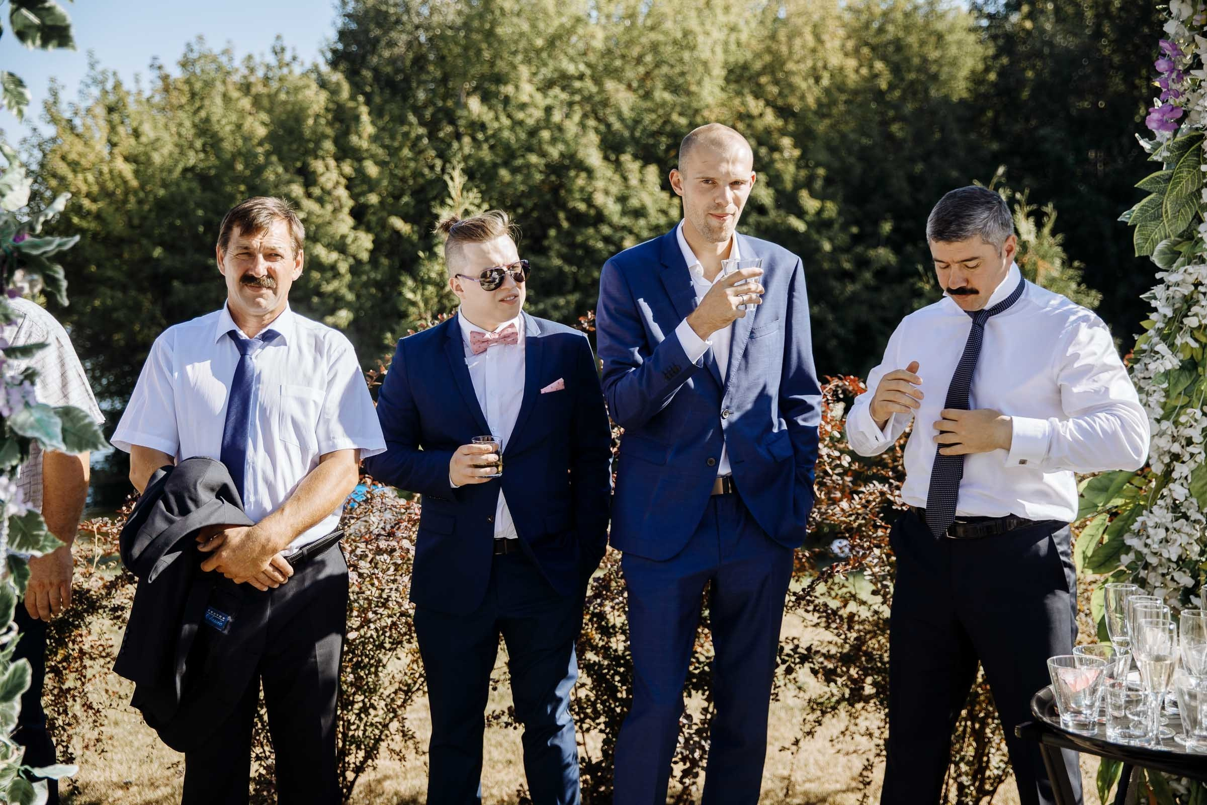 Groomsmen waiting, by Tanya Bogdan, Bude wedding photographer.  