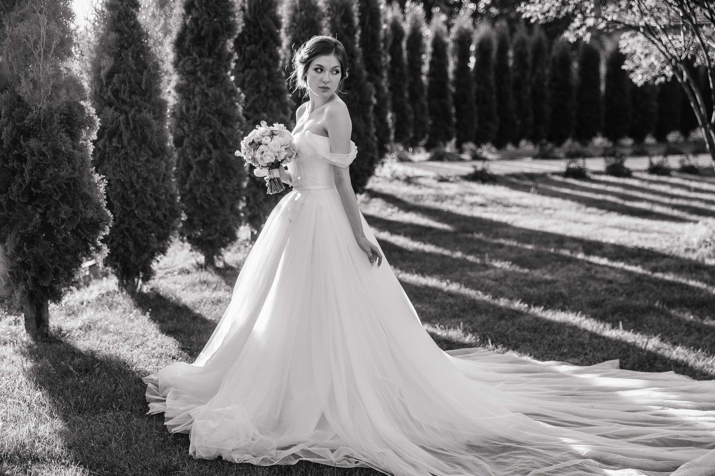 Bride's portrait in garden venue, by Tanya Bogdan, London wedding photographer.  