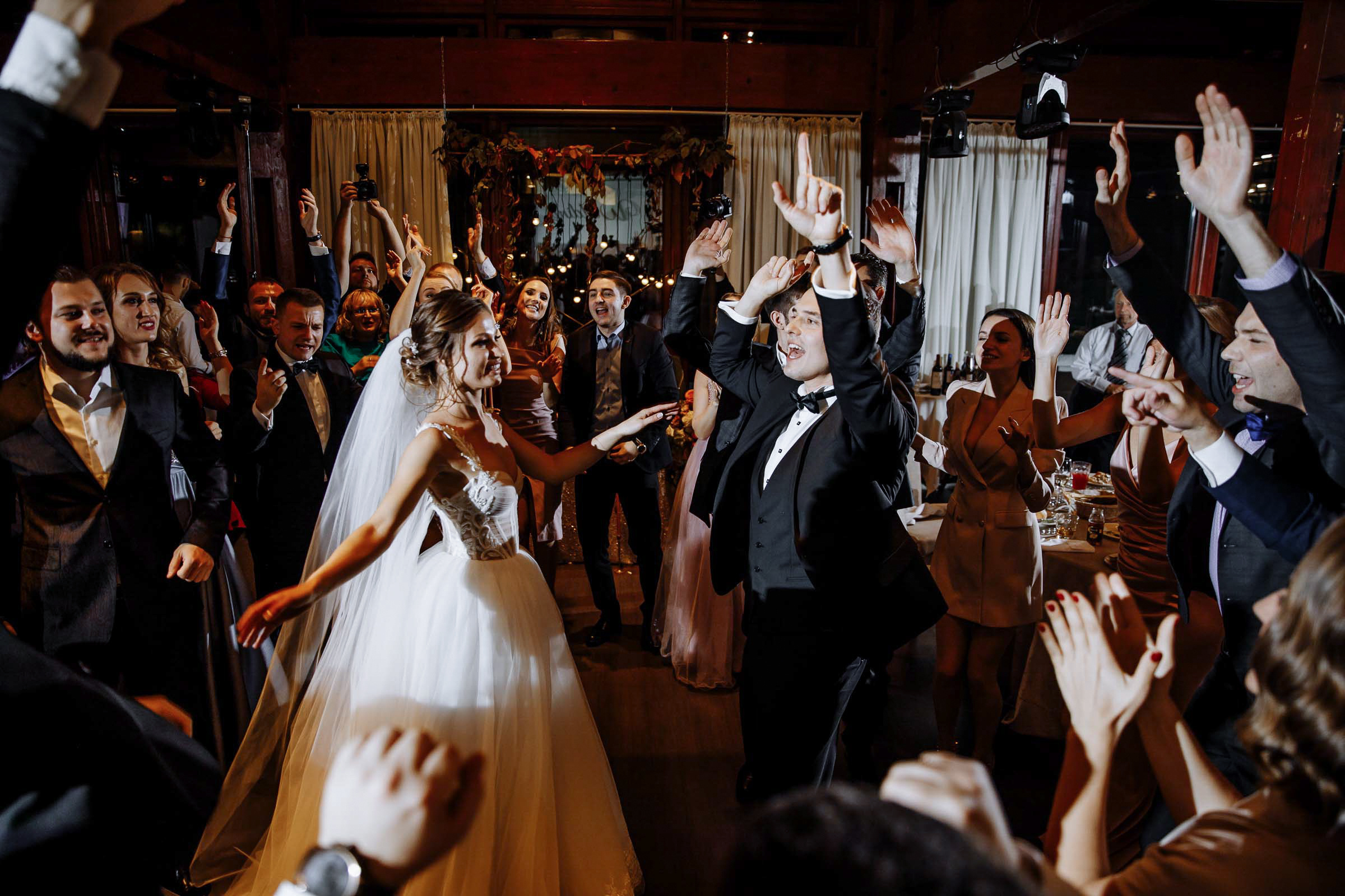 Bride and groom on dance floor in venue, by Tanya Bodgan, Bude editorial and reportage wedding photography.  