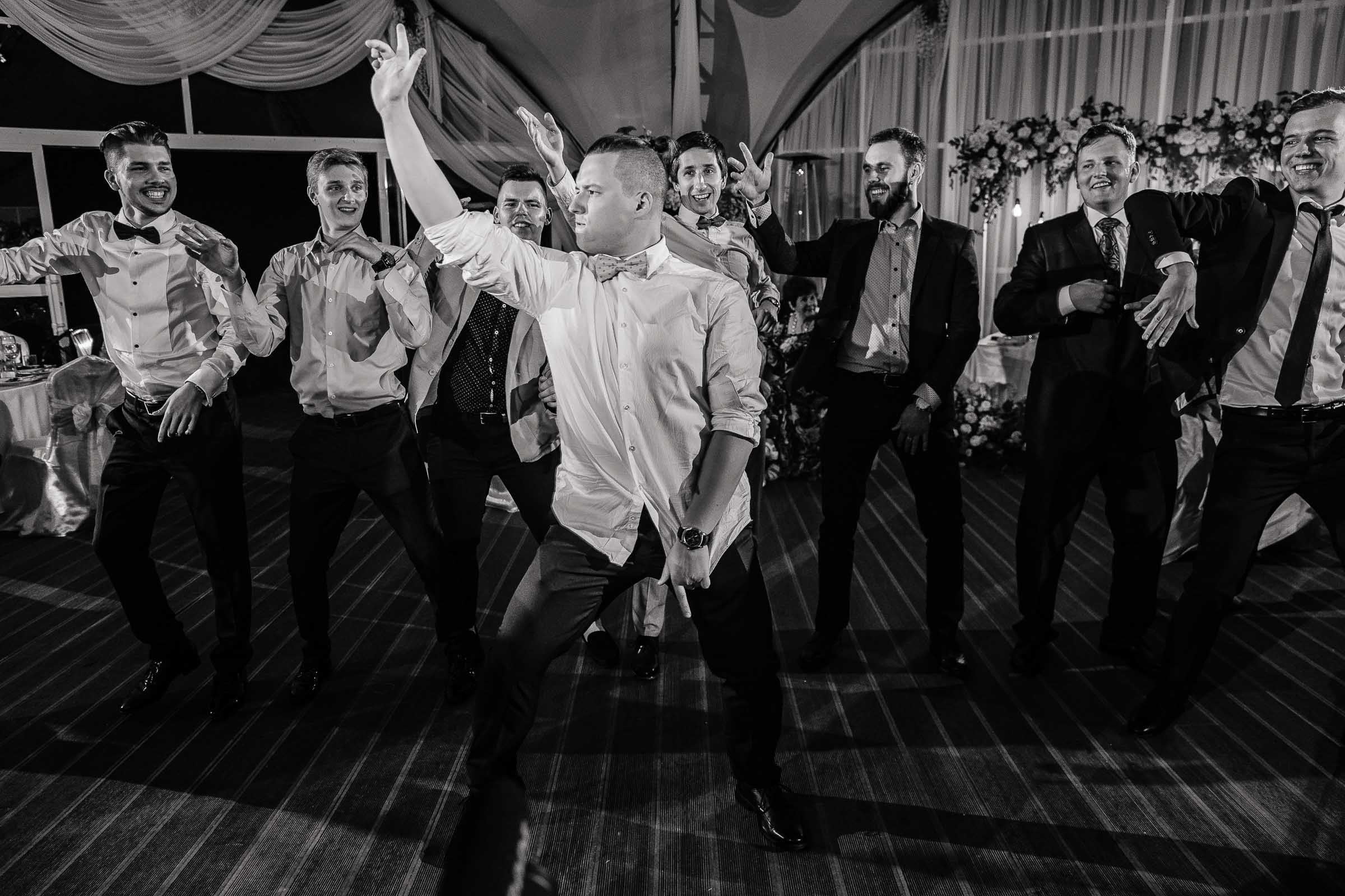 Guests dancing under marquee, by Tanya Bogdan, Bude wedding photography.  