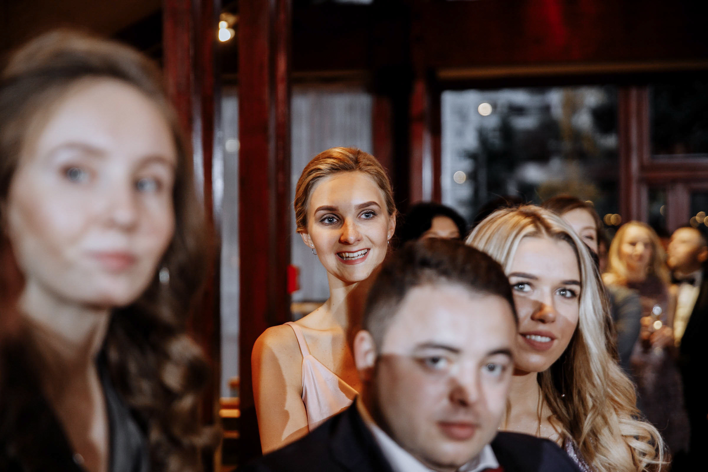 Guests in ceremony venue, by Tanya Bodgan, Falmouth wedding photographer.  