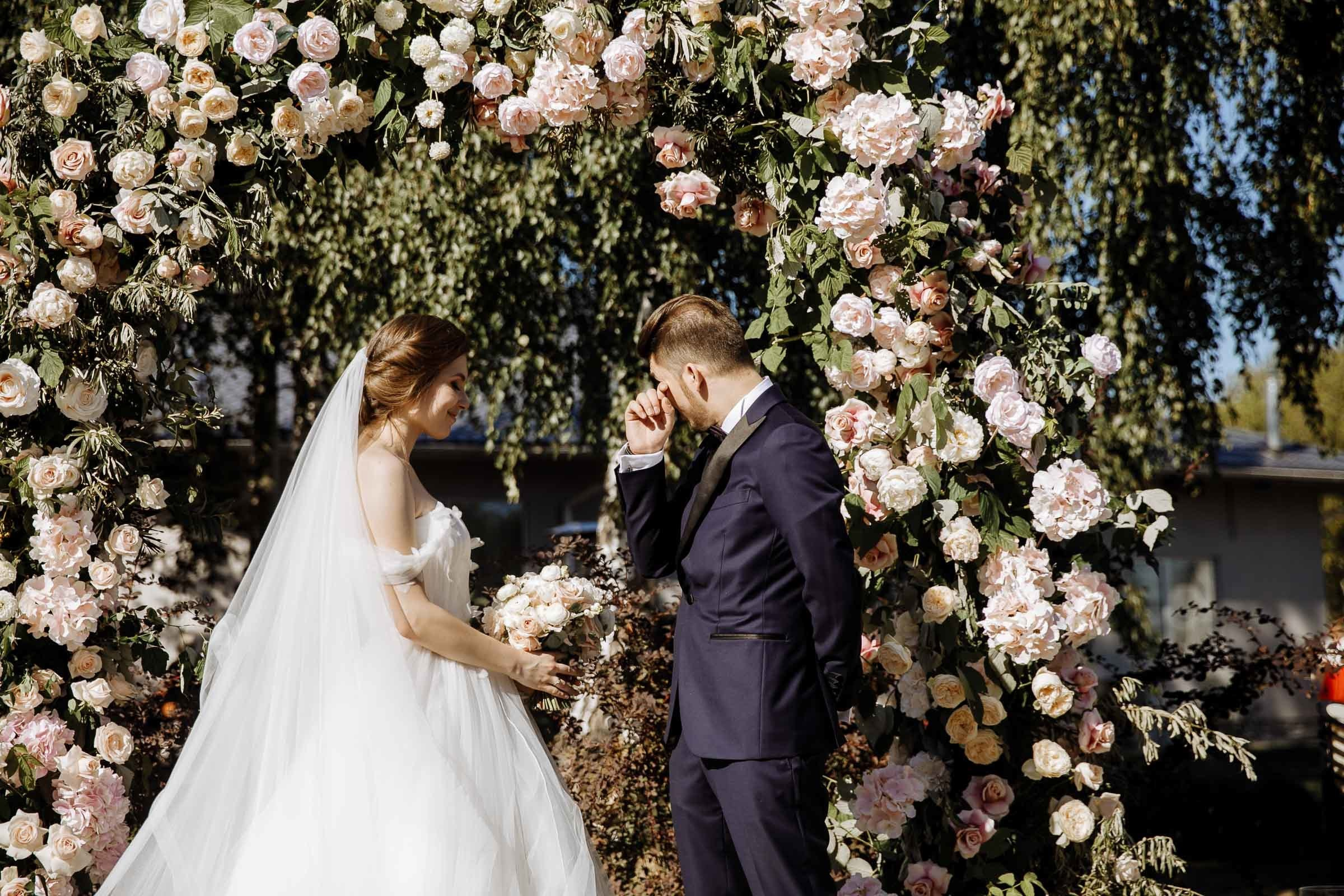 Groom’s reaction to bride , by Tanya Bogdan, St Ives wedding photography.  