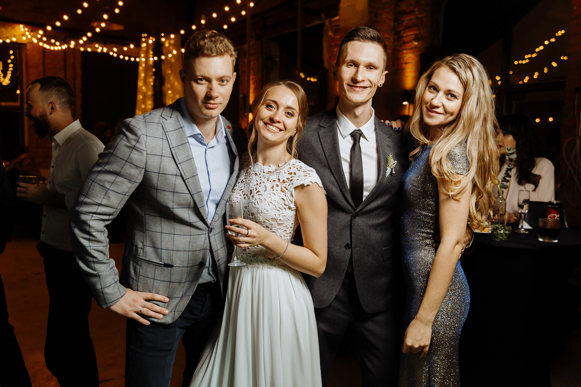 Guests with bride and groom, by Tanya Bogdan, London wedding photographer.  