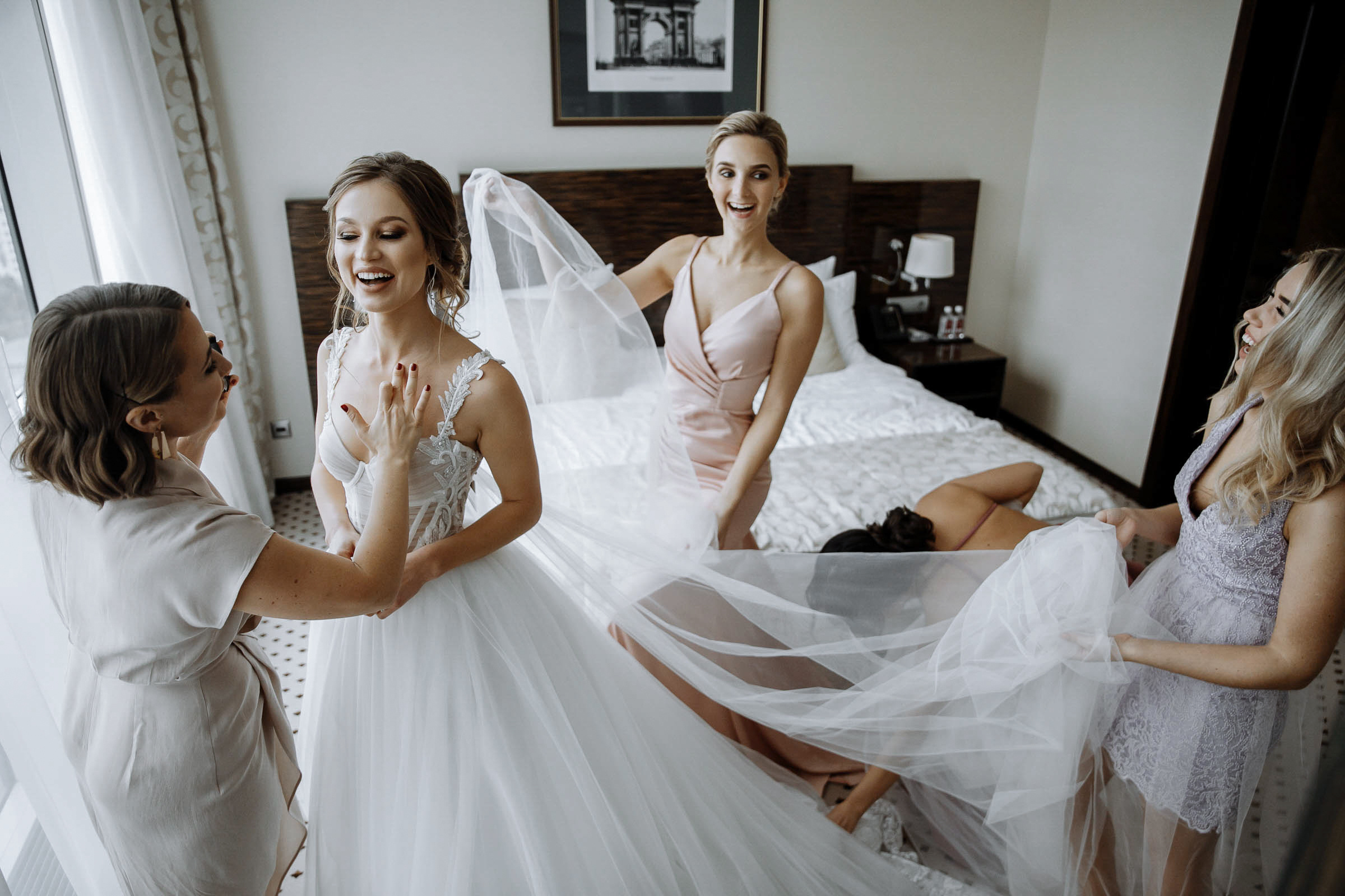 Bride’s morning smile indoors, by Tanya Bodgan, Exeter wedding photographer.  