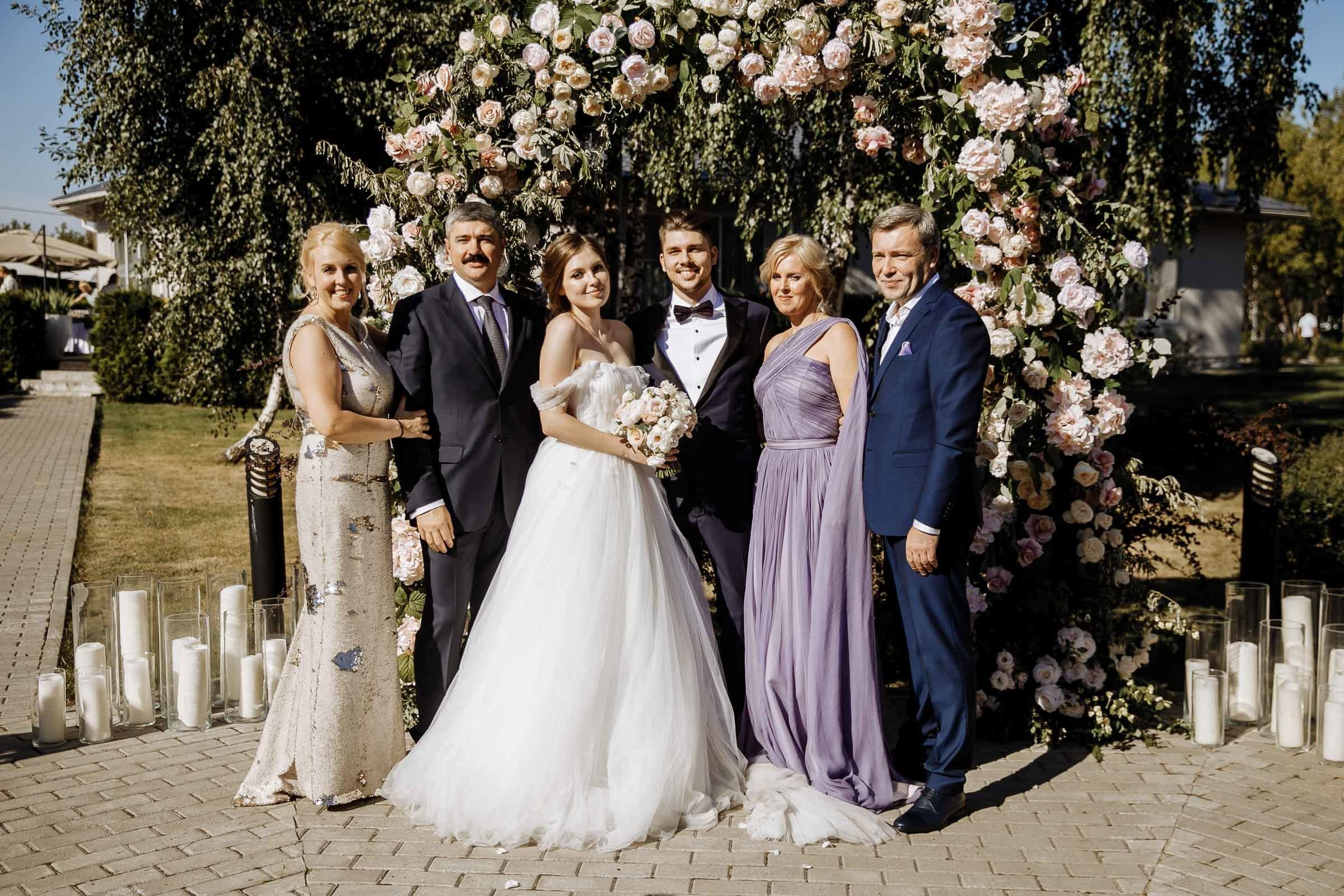 Family portrait in garden venue, by Tanya Bogdan, Bude wedding photography.  