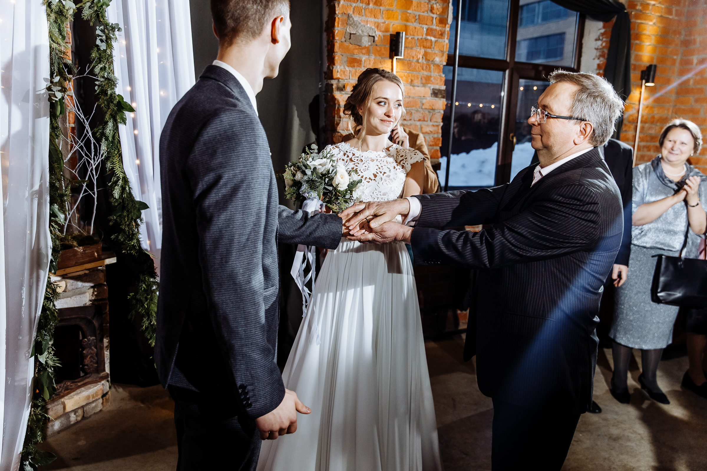 Father gives away daughter in city venue, by Tanya Bogdan, Bude, Cornwall wedding photographer.  
