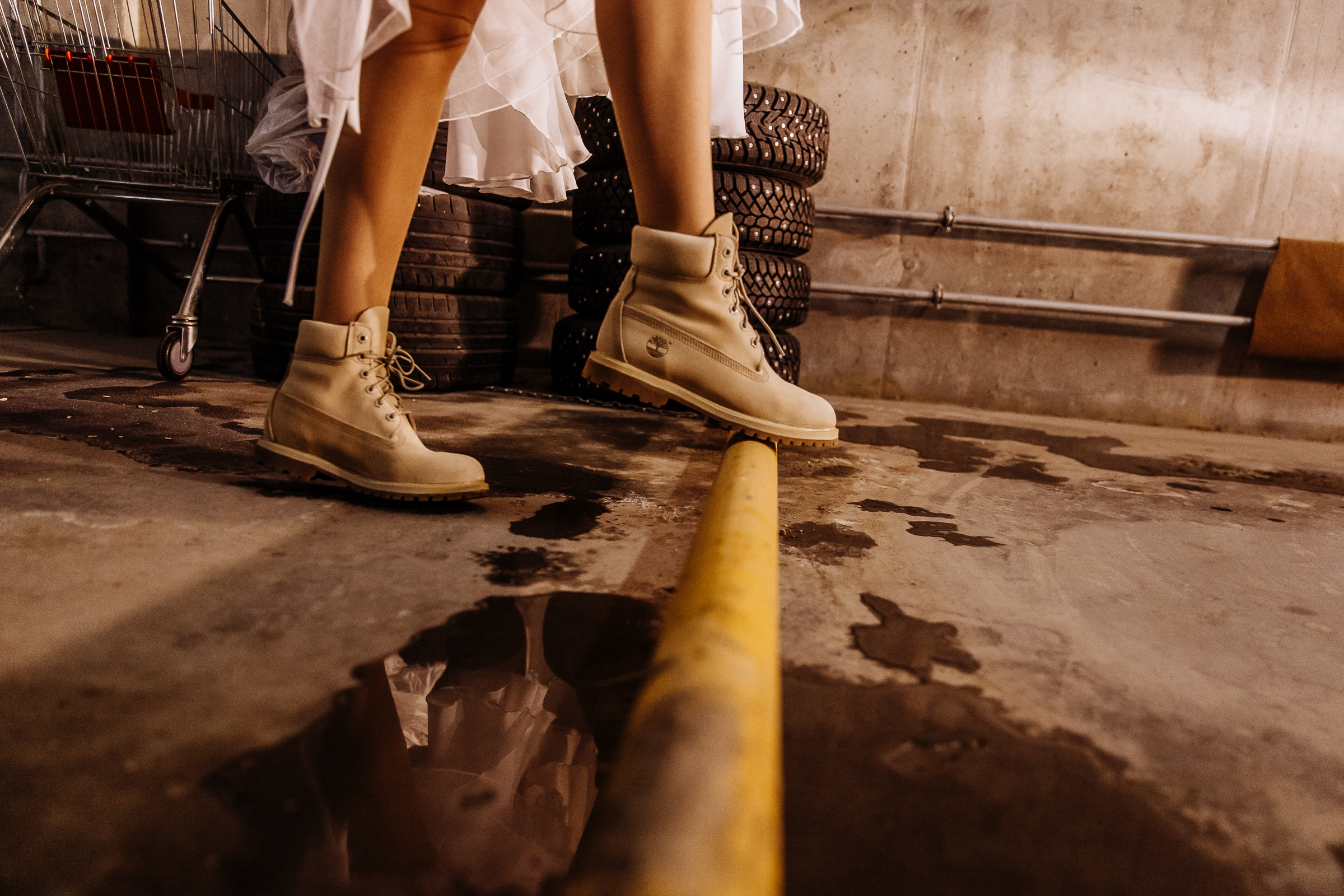 Bride shoes close up in car park, by Tanya Bogdan, Bude wedding photography.  