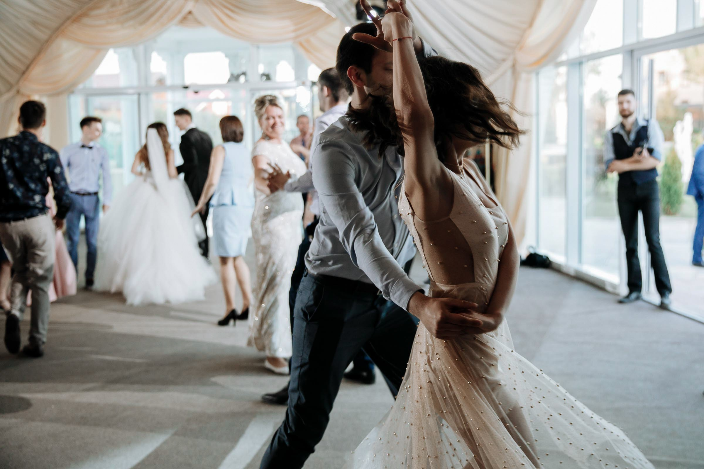Dance floor celebration, by Tanya Bodgan, Exeter wedding photographer.
