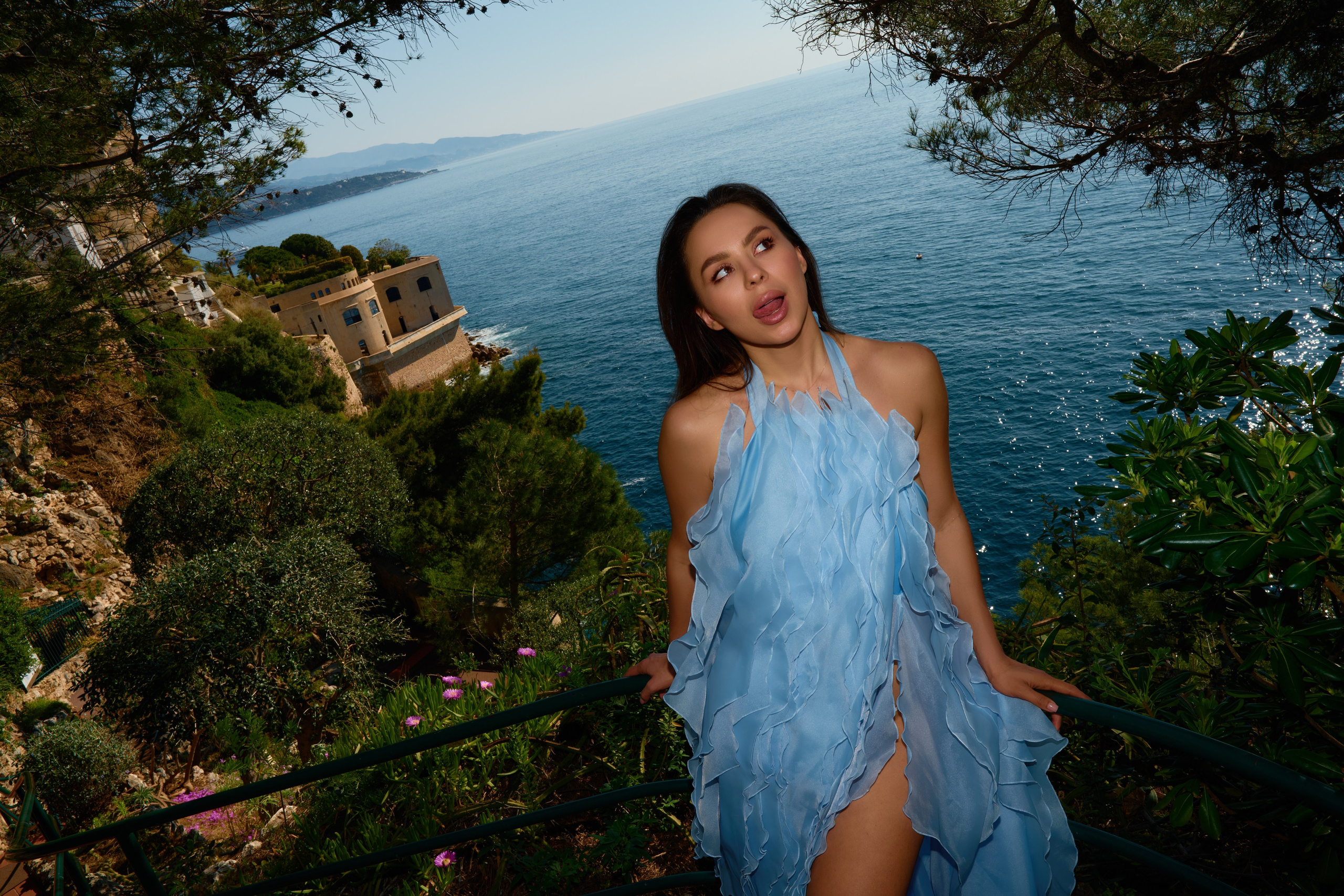 Close-up portrait of woman with ocean view near Oceanographic Museum Monaco